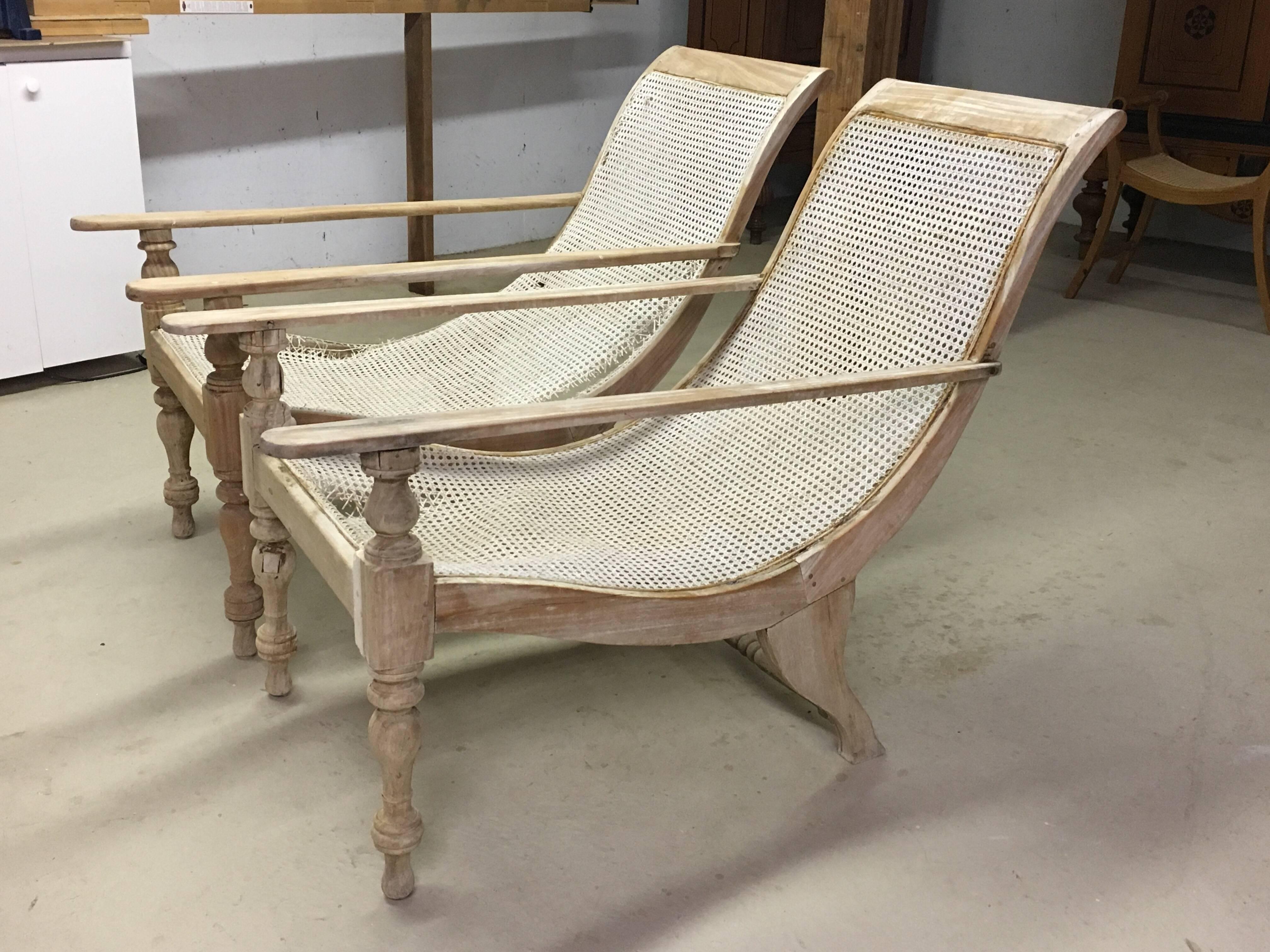 Pair of Dutch Colonial Solid Satinwood Caned Sling Back Planters Chairs, c. 1850
Bleached Solid Satinwood with new caning.  Can be used for outdoor use.  Some photos show the chairs before re-caning.  They were recently re-caned and are in excellent