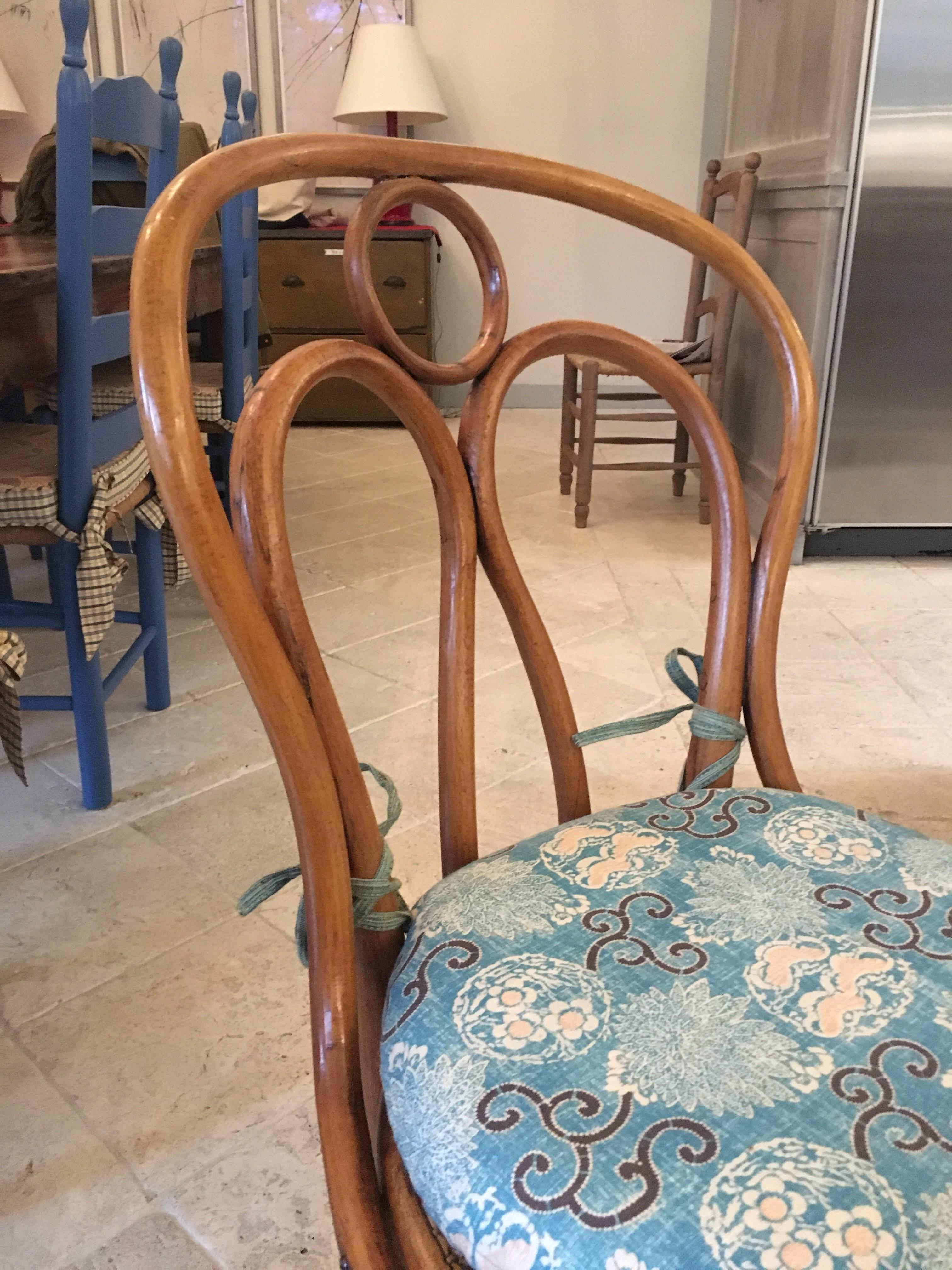 Set of seven mismatched Thonet style bentwood side chairs with custom-made cushions.
Three Viennese Chair J & J Kohn Nr.36 style chairs. (Circle motif at top)
Two no. 18 styles chair
Two Viennese Chair D.G.Fischel Nr.20 style chairs.

These