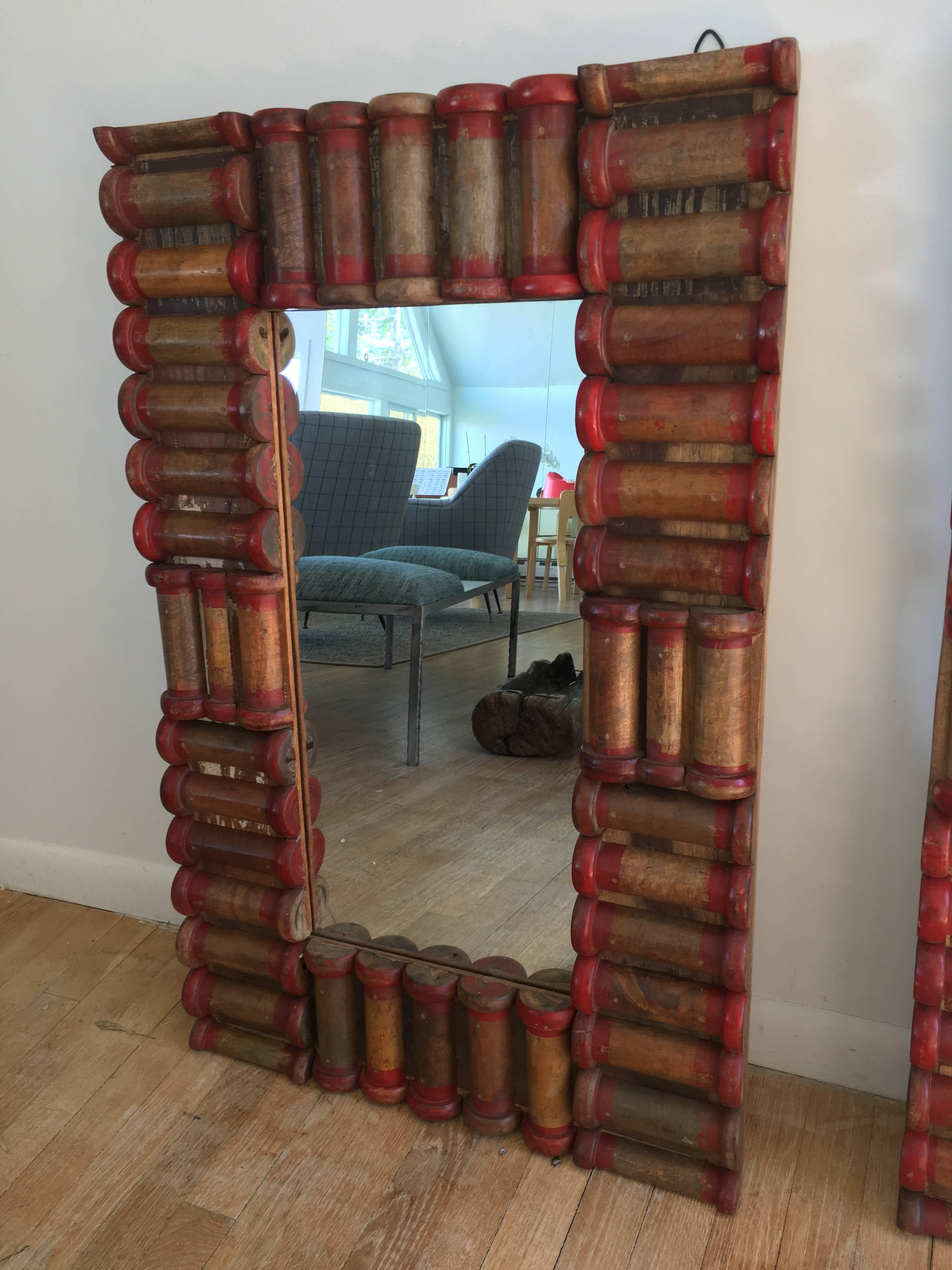Wooden mirrors made from repurposed wooden spools. Sold separately.
  