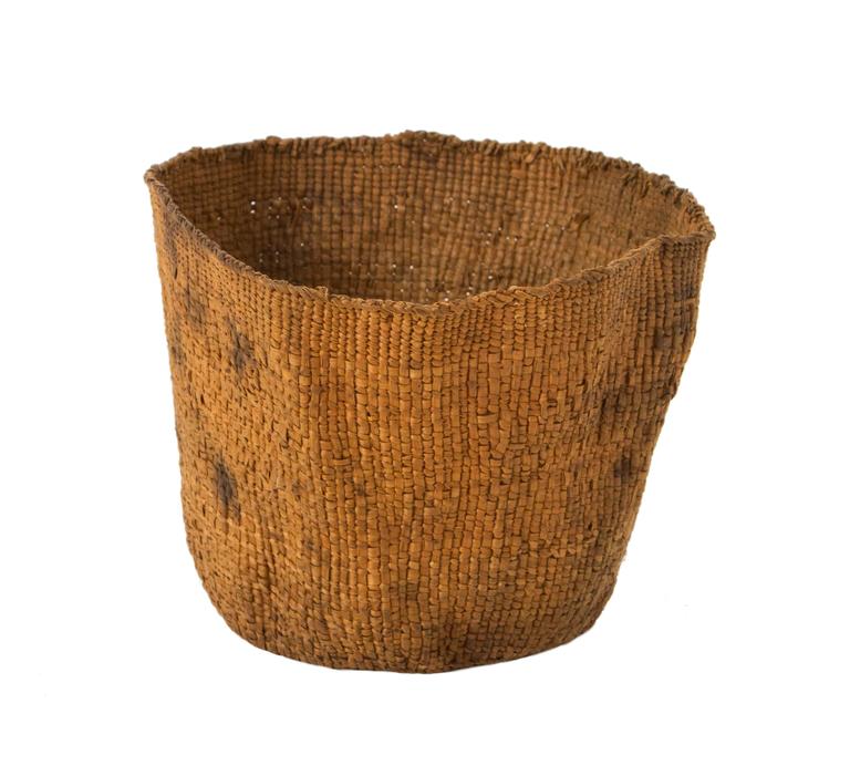 Native American Thlinglet basket 

Hand written description reads:
Spruce root basket 
Made by Mrs. Archie White Thlinget, Ko Ax Day Ooh. She died when she was about 97. Year of death is fall of 1962. This basket was made when she was much
