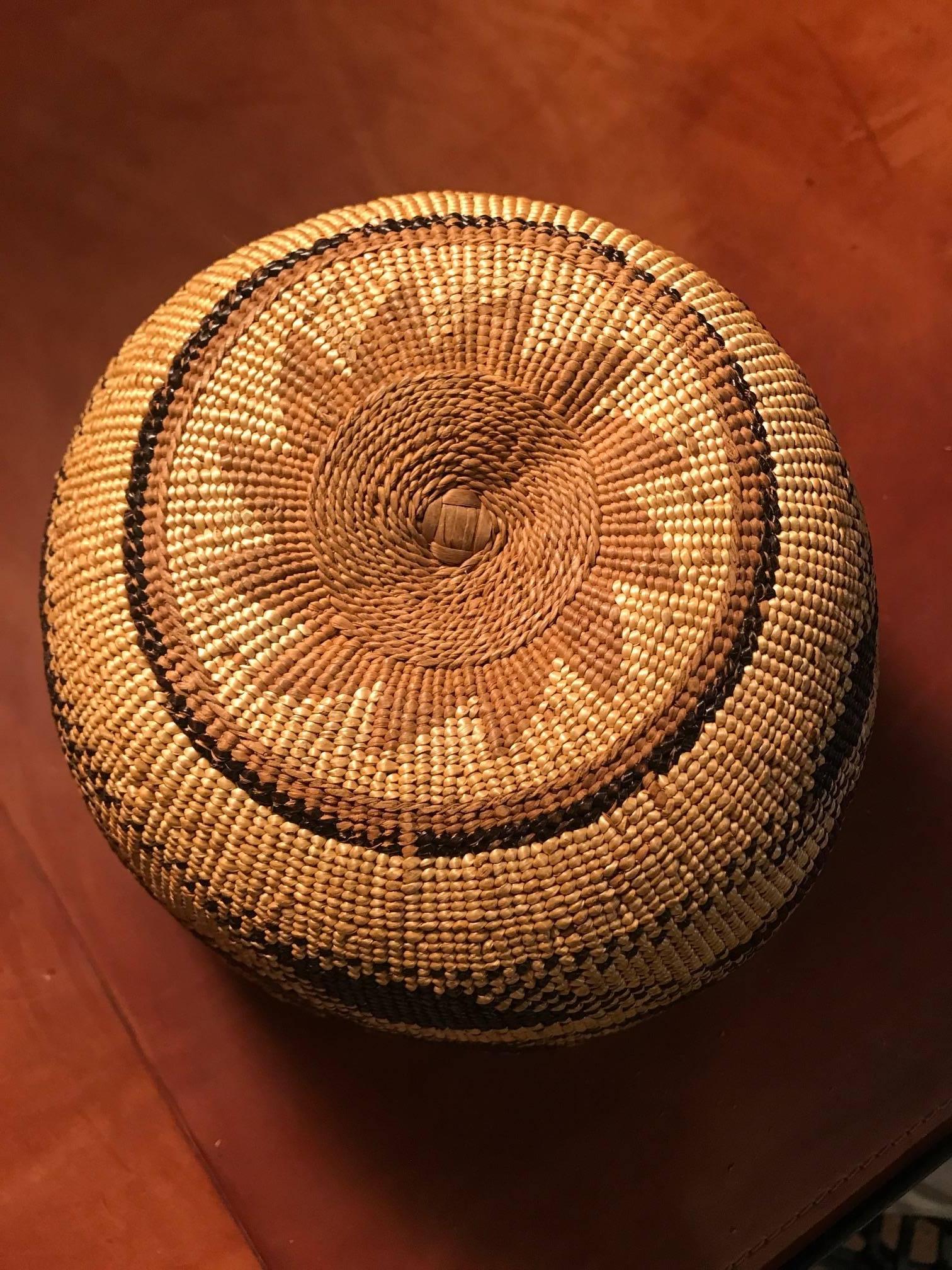 Native American Hupa hat basket 

The Hupa tribe, are the original people of Northern California. The Hupa tribe made small rounded or fez-shaped basket caps from tightly coiled sumac. The Hats were mainly worn by the Hupa women.