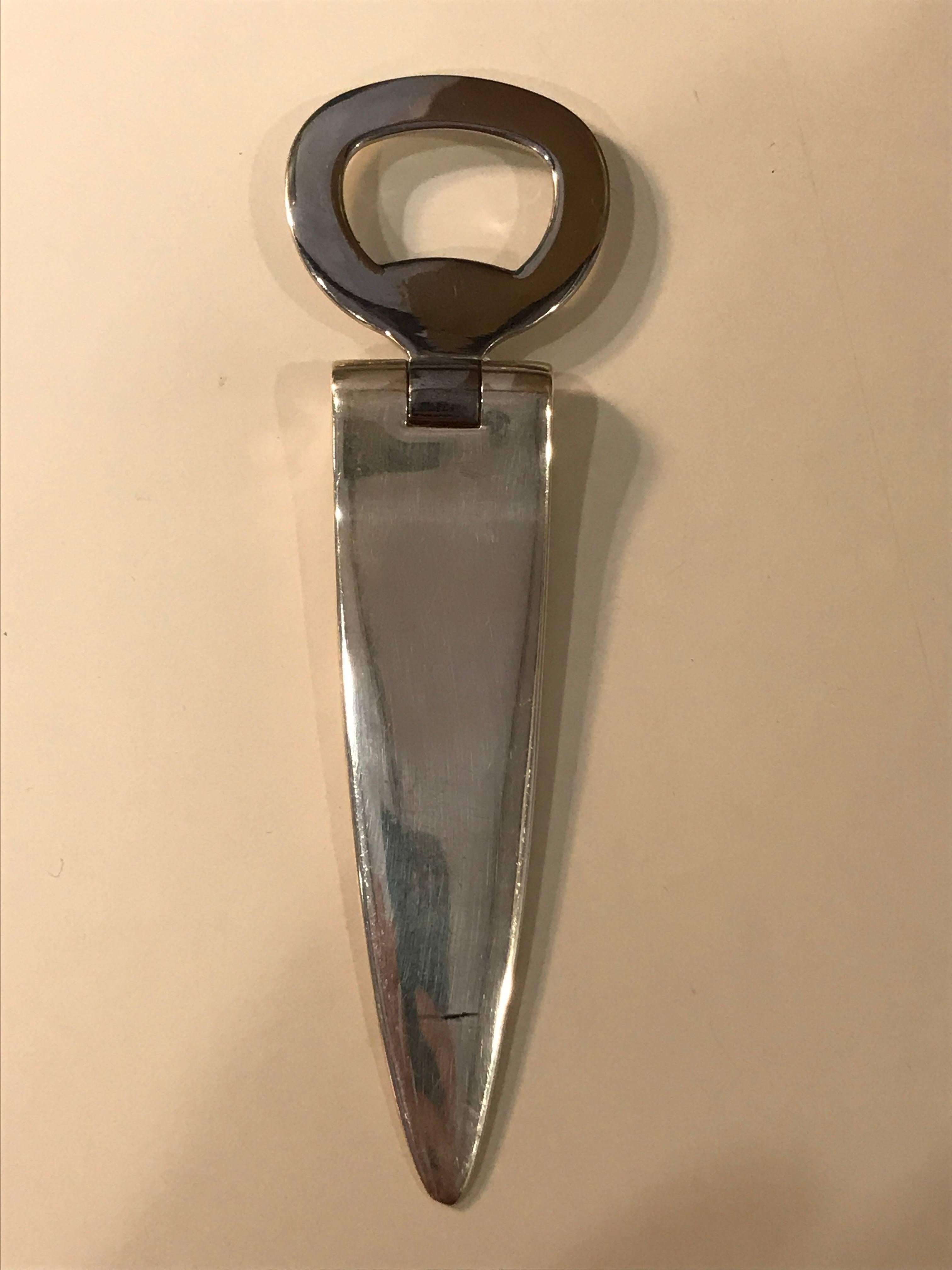 Bvlgari bottle opener
Sterling silver handle with a stainless top head.
 