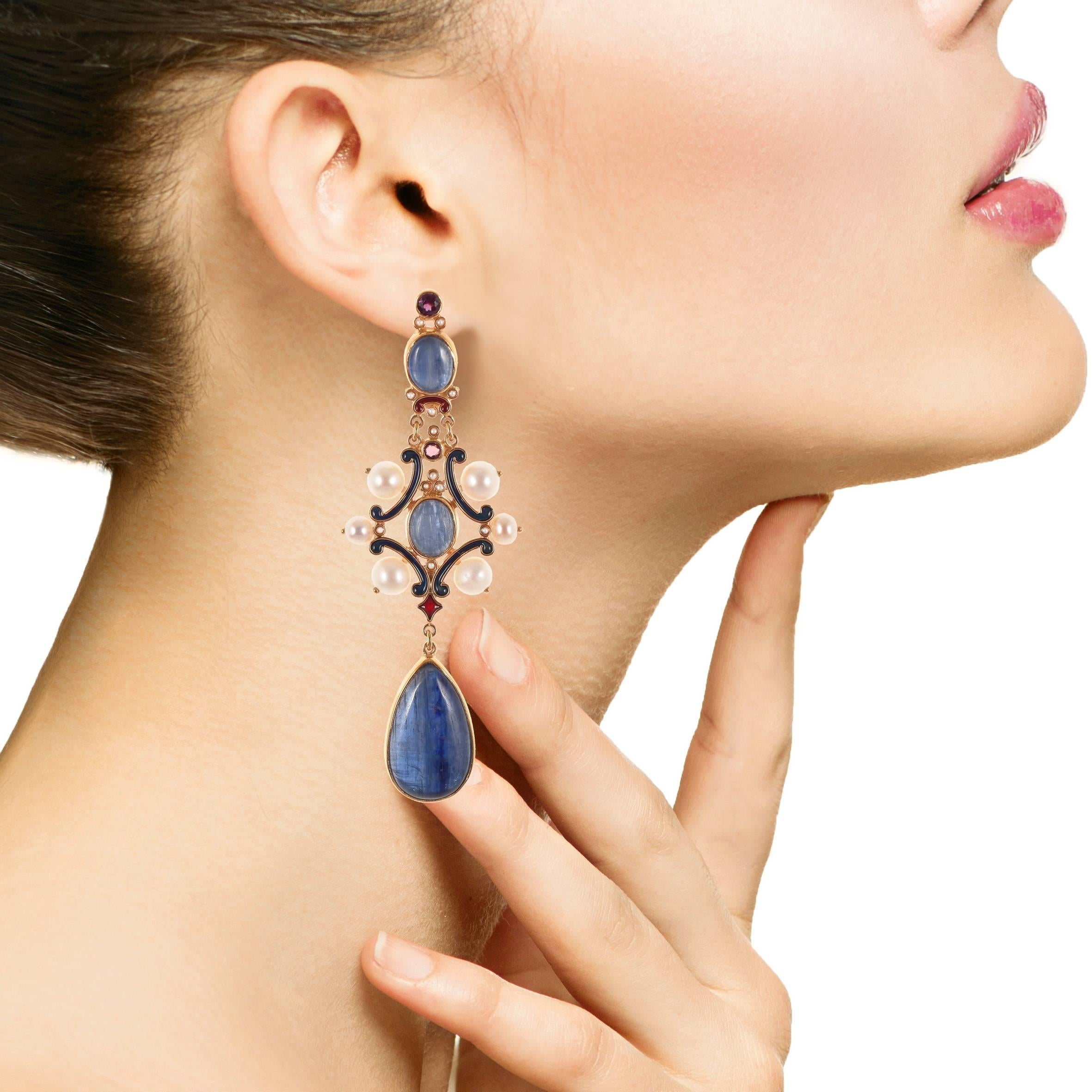 The earrings are handmade, gold-plated with precious stones: Rodalite, kyanite, micropearls. 
Pierced earrings. 

They are designed by Diego Percossi Papi and manufactured in his laboratory in Rome.