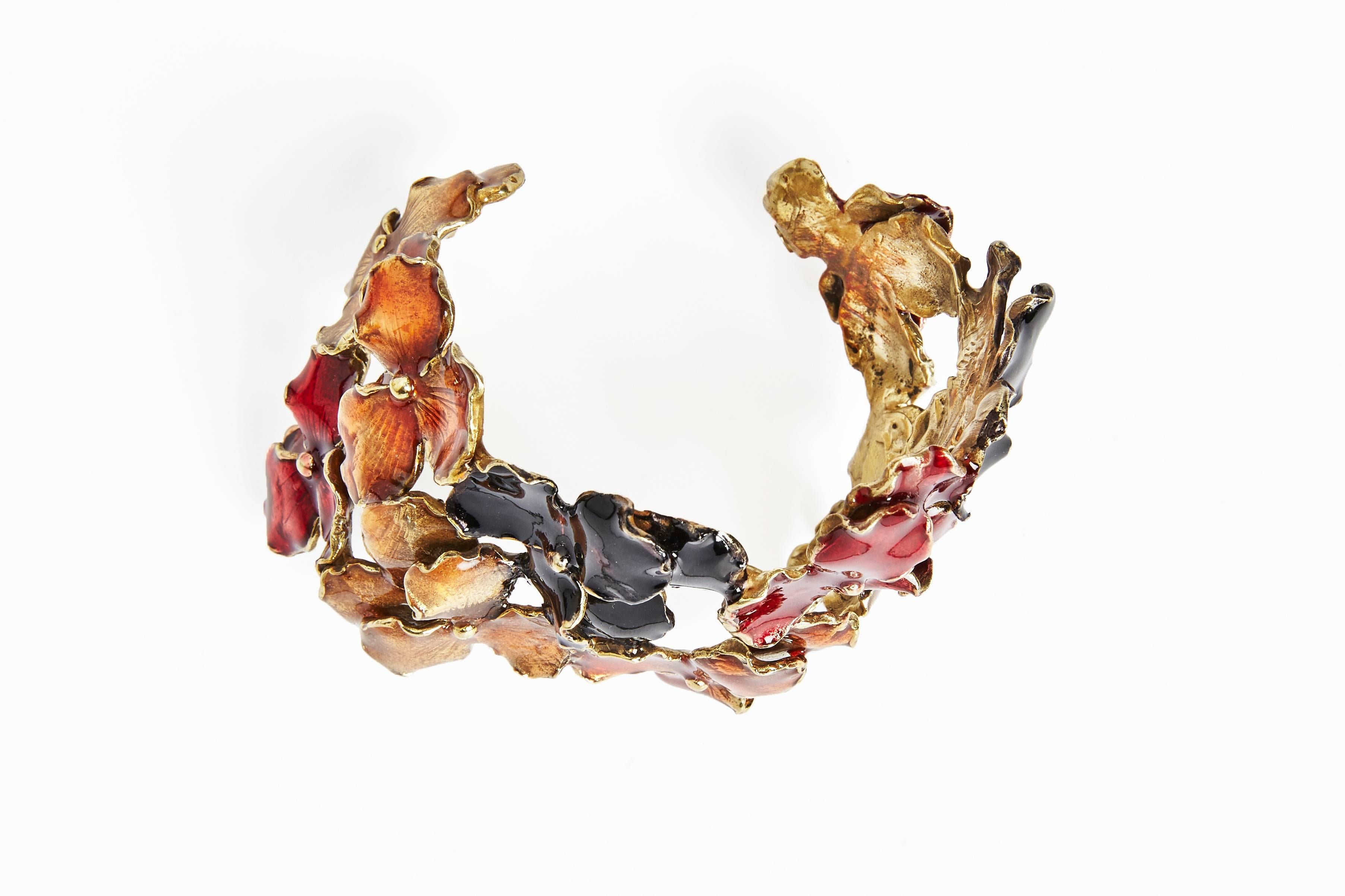 The enameled Panze bracelet by Osanna and Madina Visconti. The beautiful cuff is made from brass and multicoloured enamel. Handcrafted in Italy by Osanna and Madina Visconti di Modrone.

The cuff is adjustable to fit the wrist.
