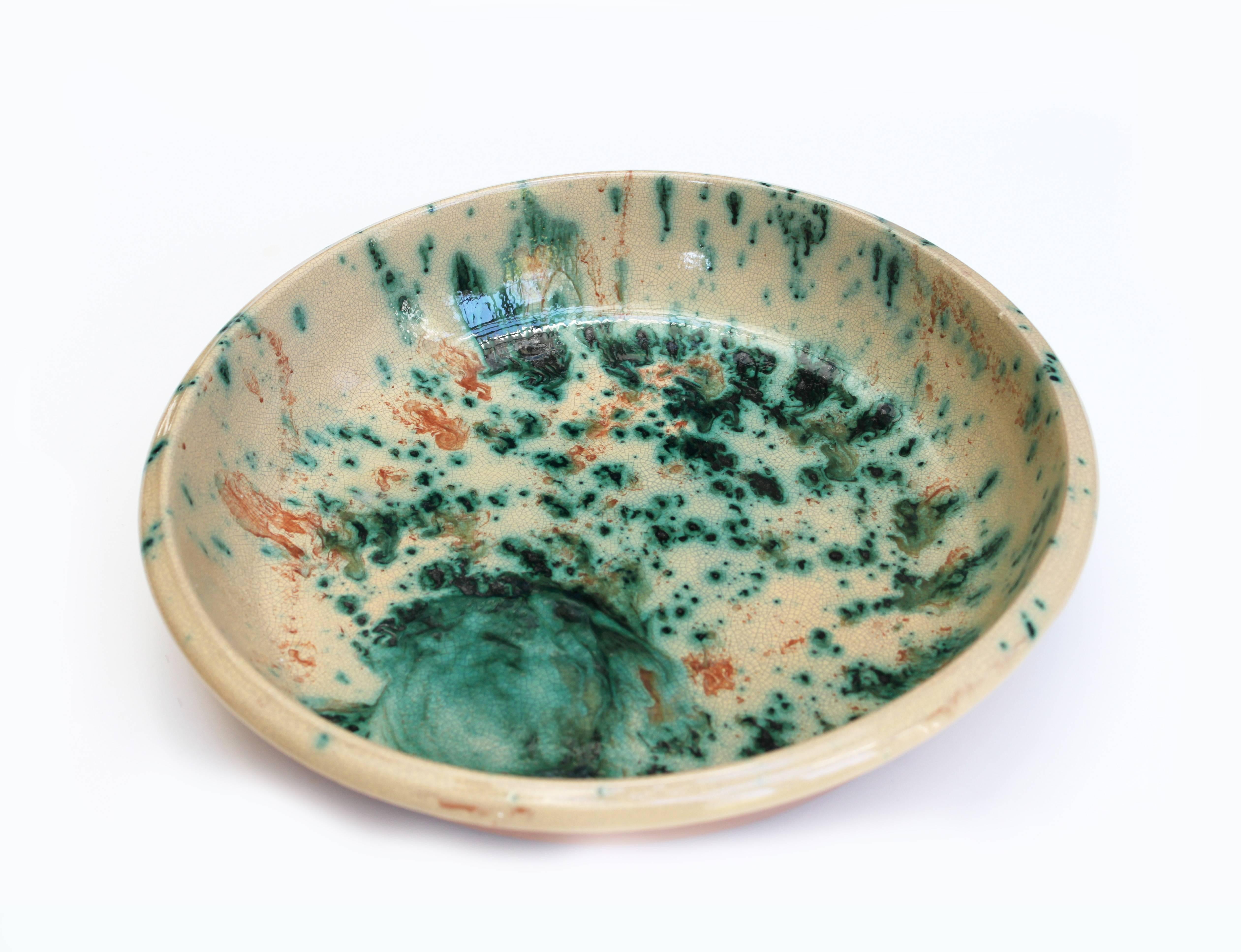 One of a kind hand-painted large ceramic bowl with beautfiful mix of greens, blues, oranges. This large bowl is handmade and painted in the South of Italy with the typical brush stroke decorative motif. Perfect as cabinet displays or as serving