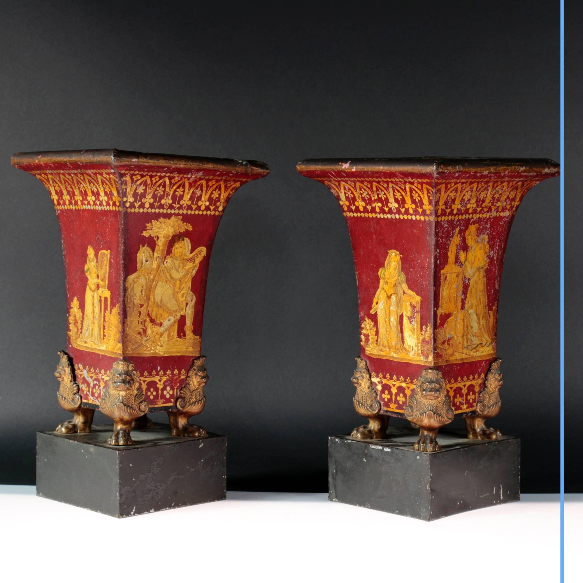 Pair of sheet metal vases in Gothic Revival style.
Painted and varnished sheet metal with gilded ornaments.
19th century,
circa 1830.
Measures: W 20.7 – H. 37.8 – D. 20.7 cm.

Pair of garden vases painted and varnished with gilded pattern,