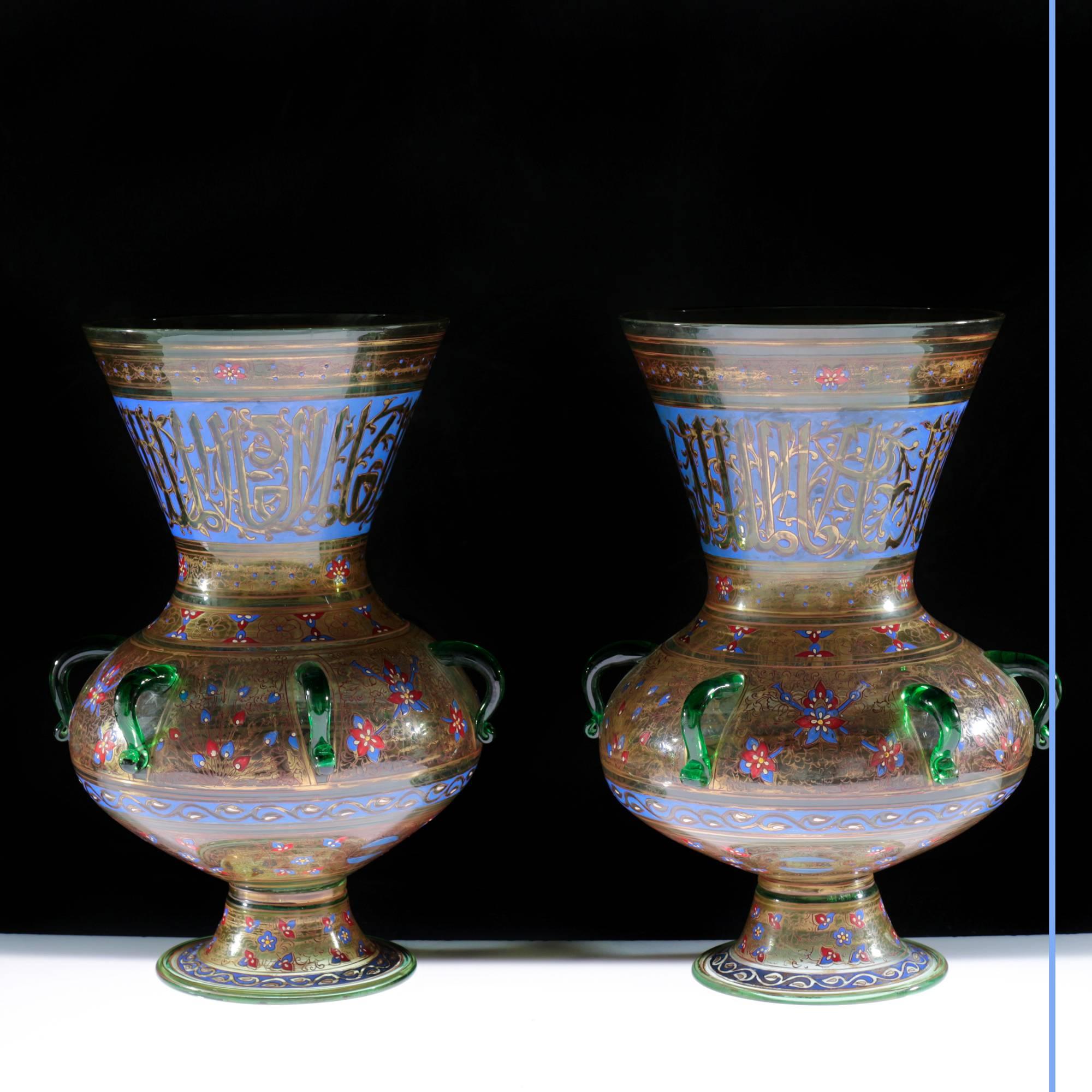 Philippe-Joseph Brocard (1831-1896). 
A Pair of Polychrom Enamelled Glass mosque lamps.
In the islamic tradition, notably Mamelouk period
Painted blown glass, calligraphic inscriptions,
19th century,
Paris, circa 1870.
Measures: H 37 cm, D 25