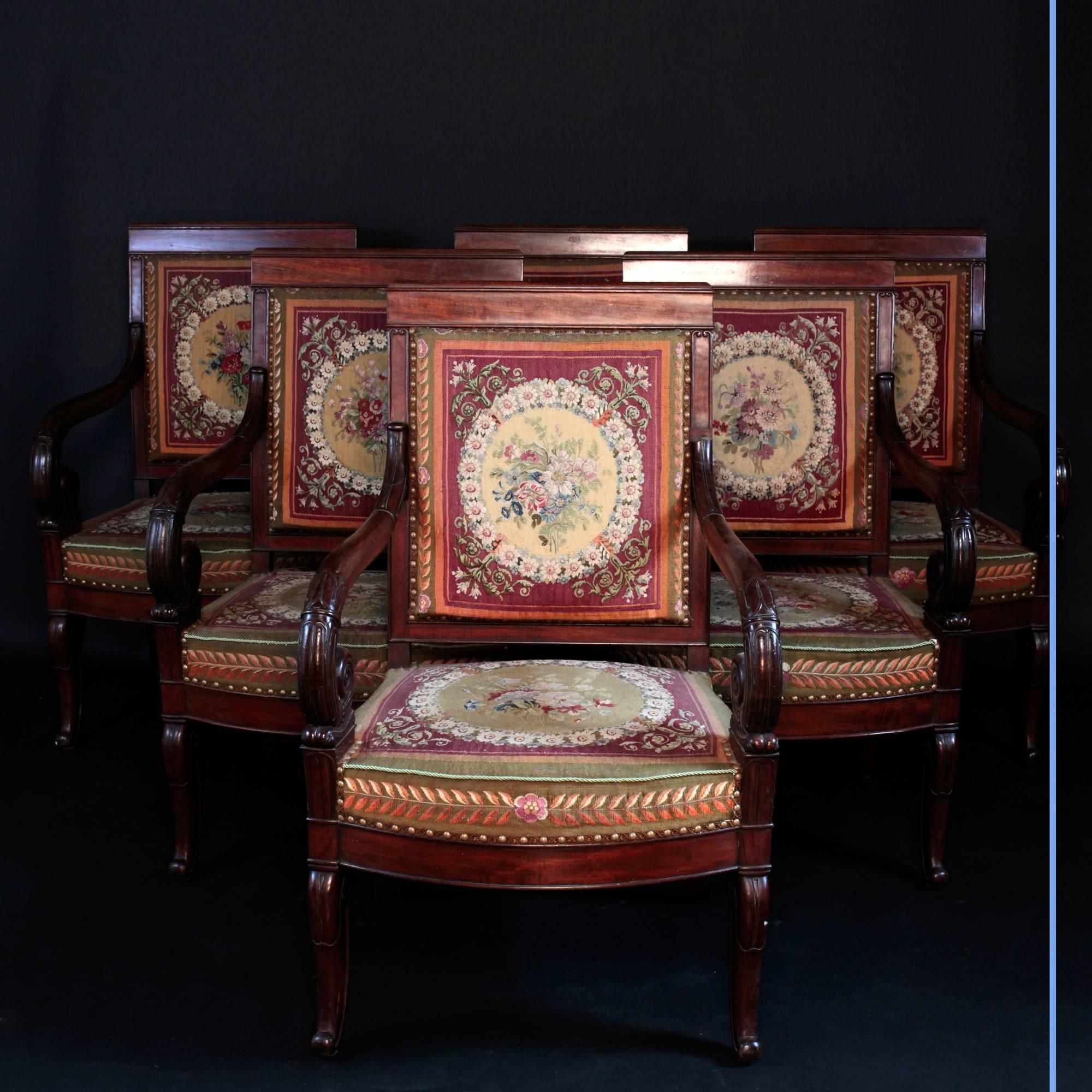Rare set of drawing room stately furniture.
Sofa, six armchairs and six chairs.
Mahogany and veneered mahogany, chairs and armchairs with high straight backs, scrolled armrests in the form of
lotus blossoms and winged foliage, resting on front