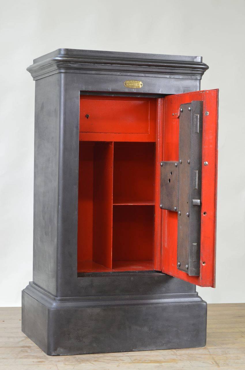This antique cast iron safe was made by the famous 