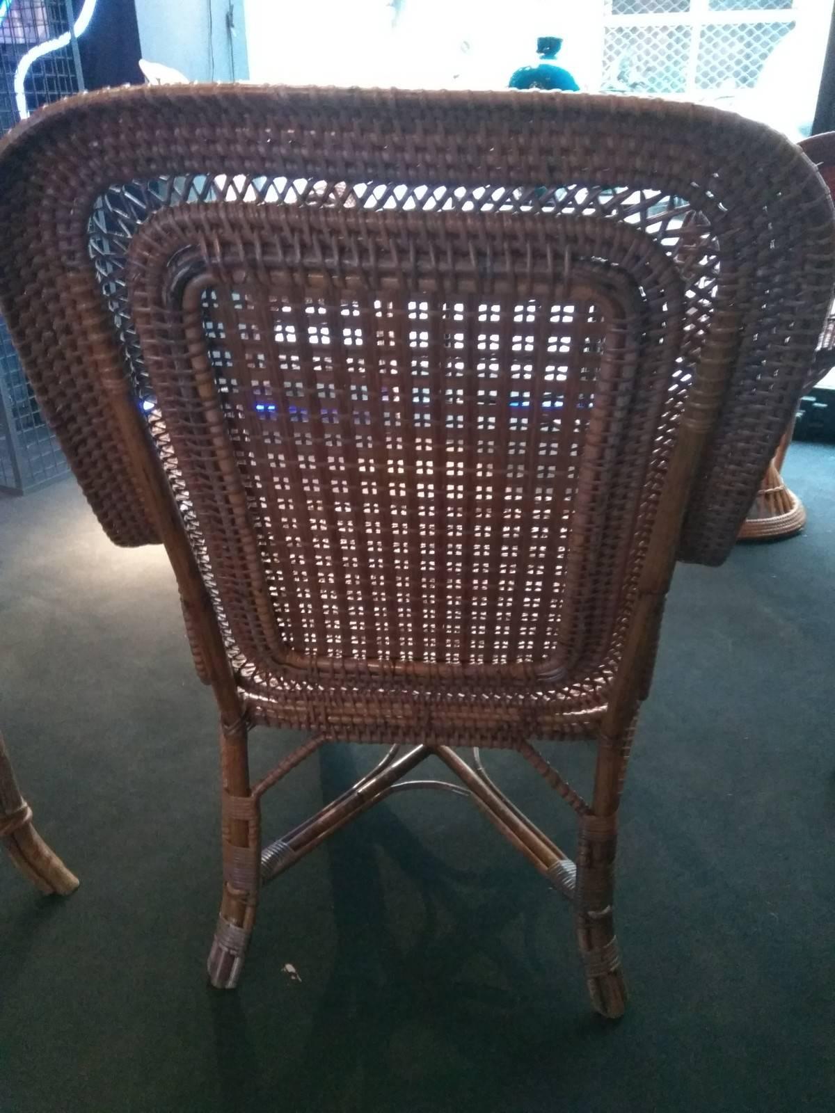 Pair of rattan armchairs realized by Perret & Vibert Manufactory at the end of 19th century.

The taste for exoticism during the Second Empire explains the enthusiasm for rattan furniture. It is visible with the massive import of raw materials