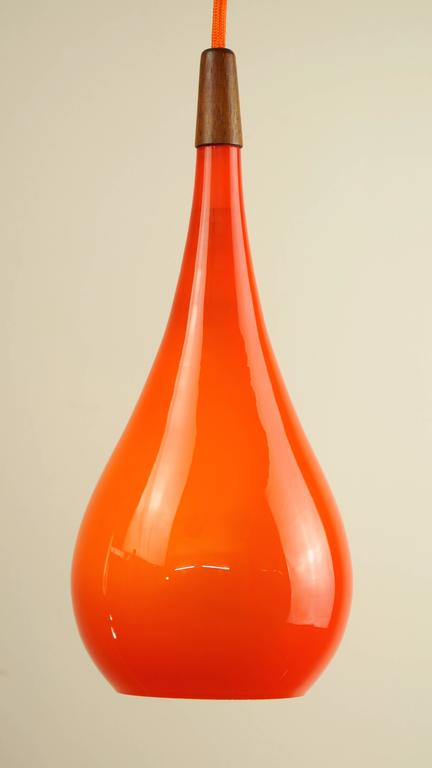 Orange Glass Pendant Light vintage orange glass and teak pendant light designer holmegaard denmark circa 1960s