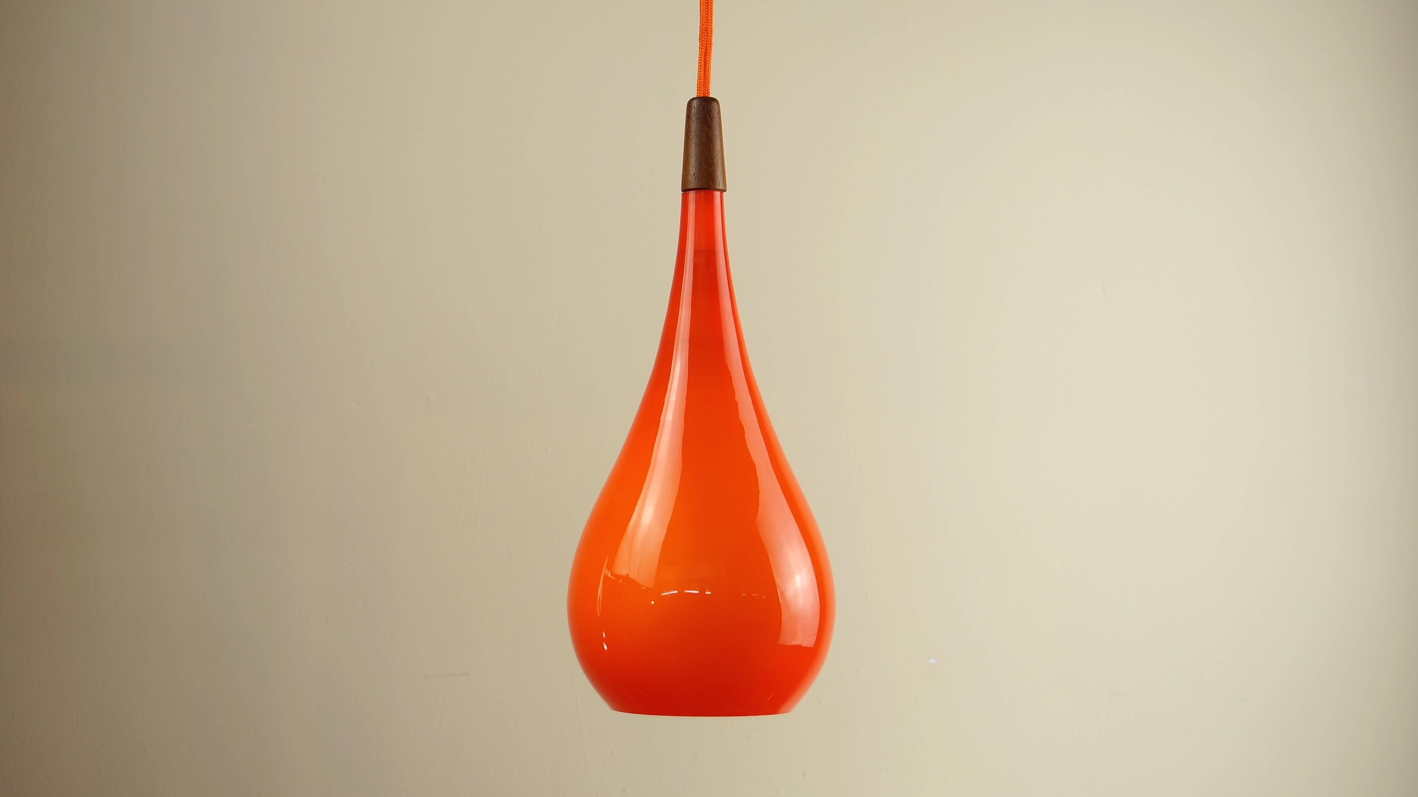 Mid-Century Modern Vintage 1960s Danish Orange Glass and Teak Pendant Light / Lamp by Holmegaard