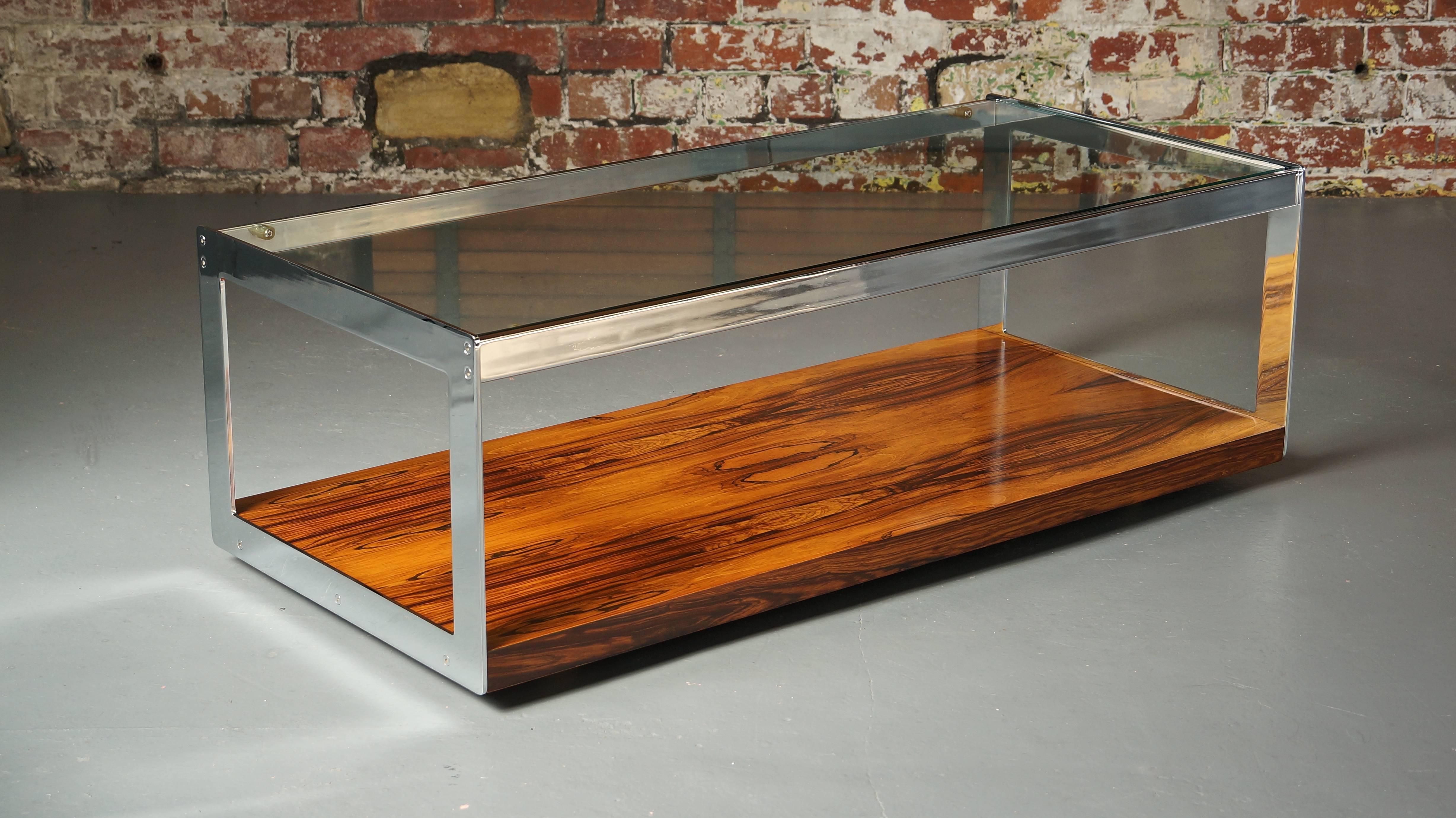 Rare 1970s chrome and rosewood coffee table
Designed by Richard Young for Merrow Associates, England

Exceptionally rare and exceedingly high quality piece offered in outstanding condition throughout. By one of the best design houses the UK had