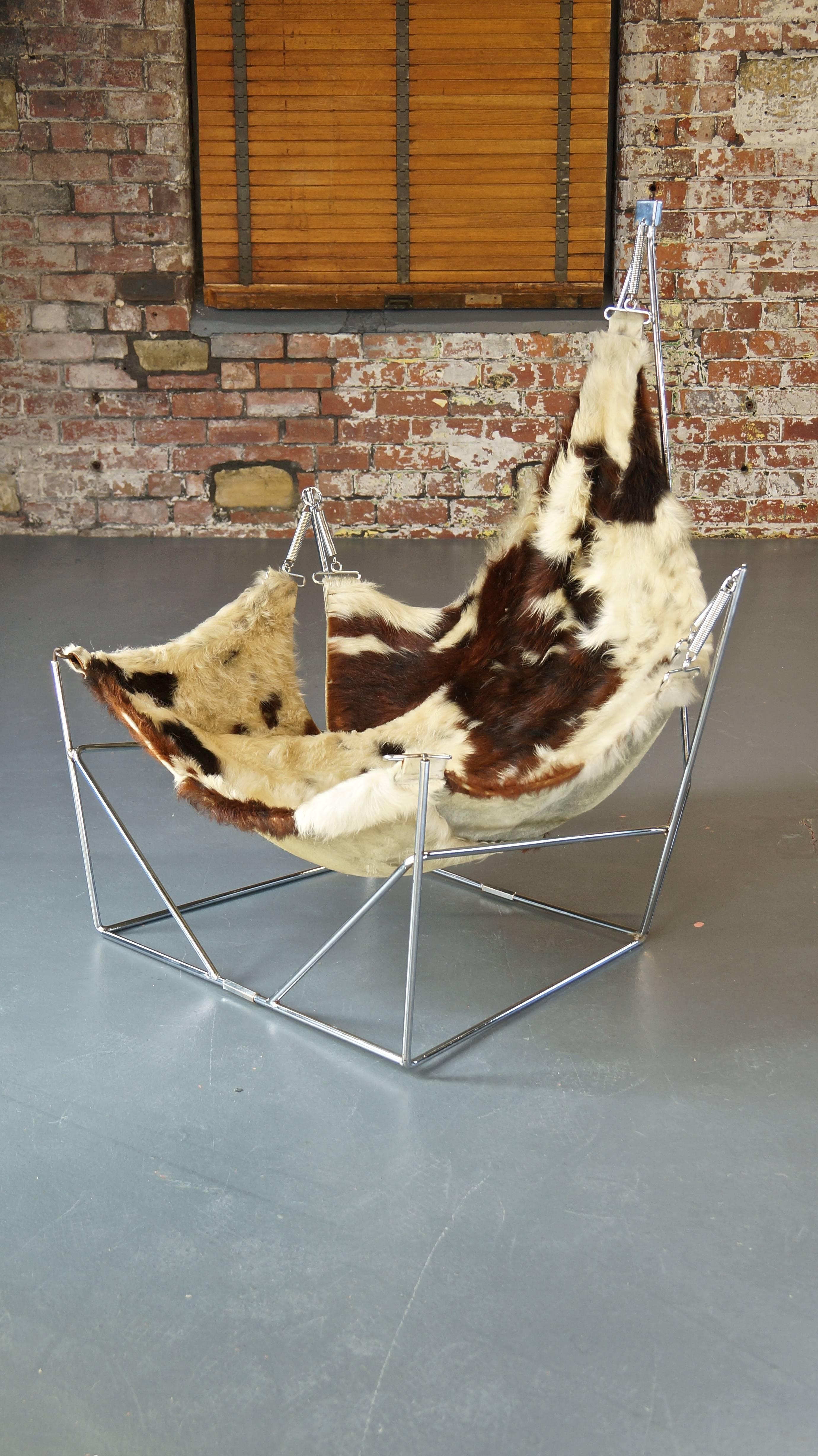 Rare sculptural metal framed cowhide sling lounge chair

Design by Attributed to Pierre Paulin 
France, 1960s

Beautiful piece of sculpture and exceptionally comfortable!

 