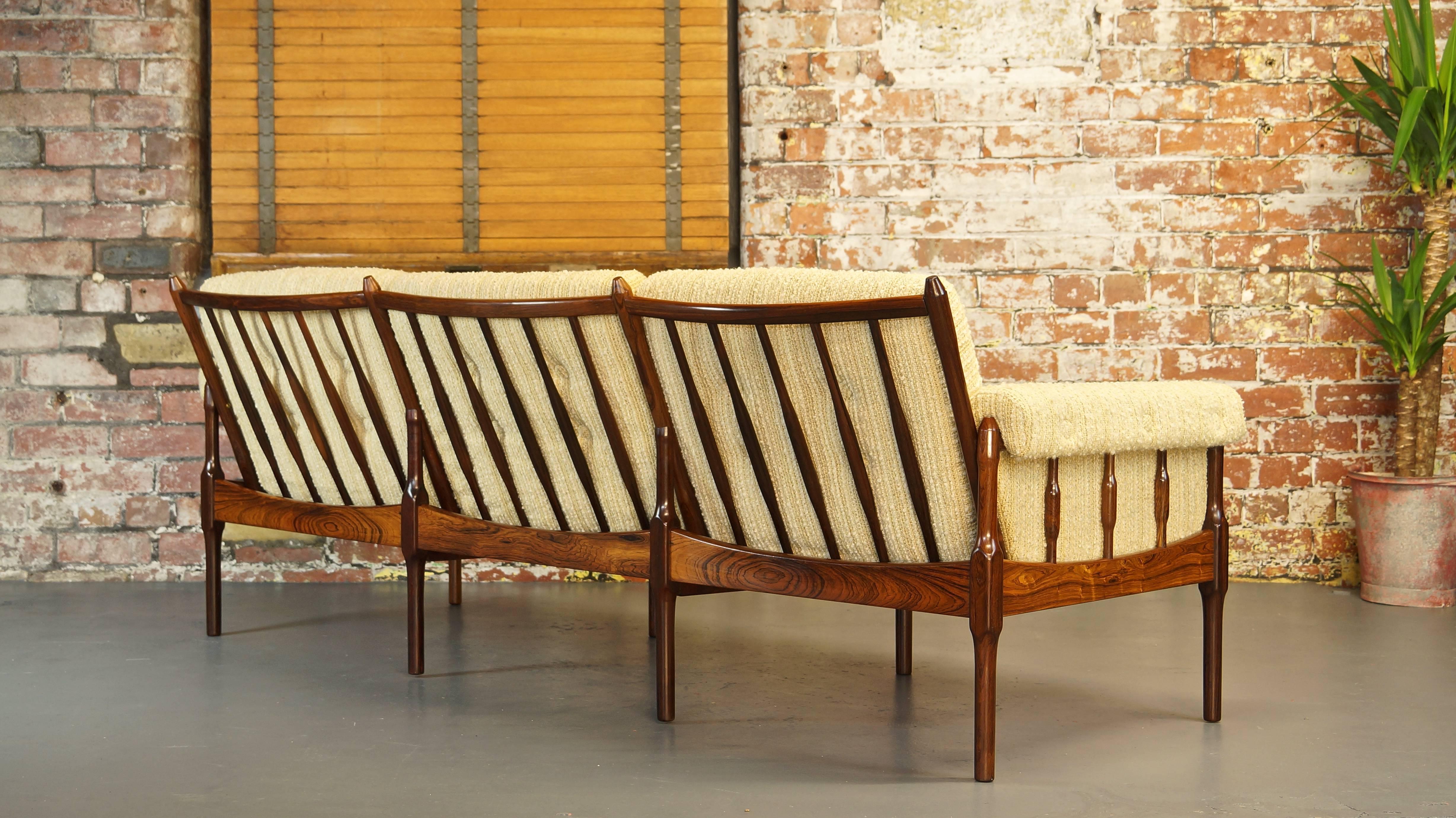 Vintage Danish rosewood sofa / settee
Designed by Torbjorn Afdal for Bruksbo
Denmark, 1960s

Solid turned rosewood three seat settee. 
Beautiful grains throughout this exceptionally constructed piece.

Measures: Height 74cm
Width