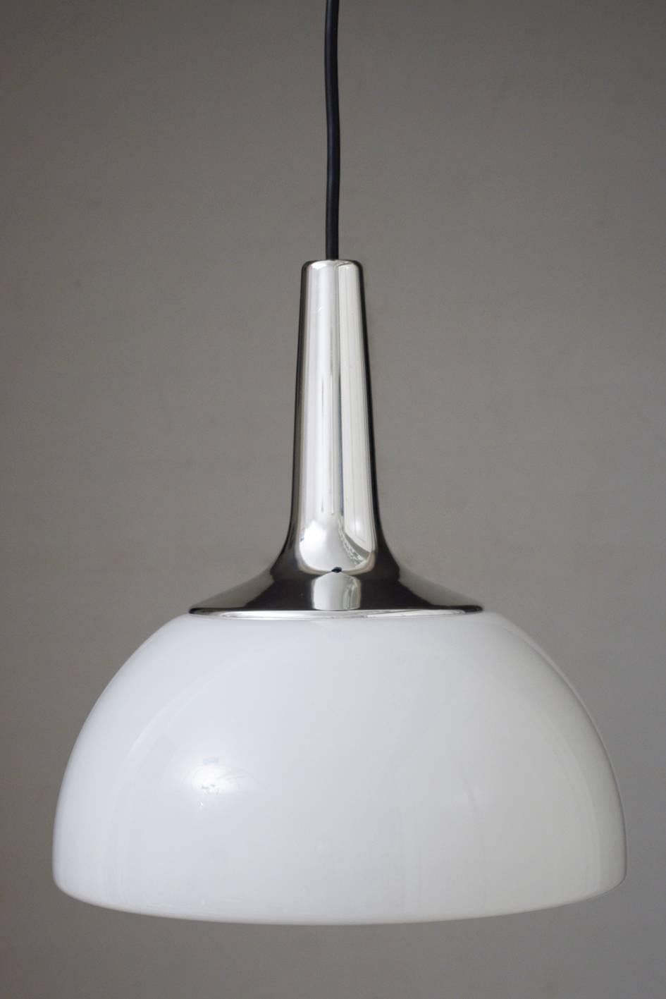 Beautiful Art Deco style white opal glass and chrome pendant light,
Germany, 1970s

Lamp sockets: One x E27 (US E26).