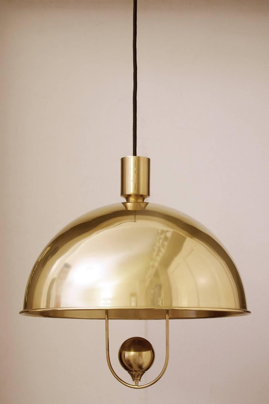 Set of three rare and large solid brass pendants by Florian Schulz.
Germany, 1960s.

 Lamp sockets: 1x E27 (US E26)