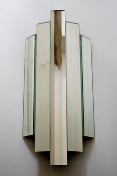 Paire de grandes appliques murales sculpturales en verre miroir encastrées, années 1960