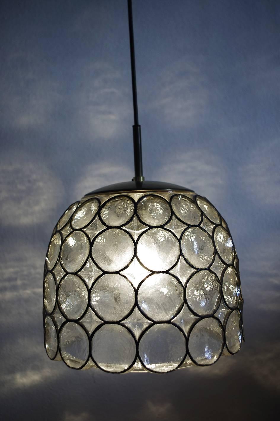 Huge hand blown glass and brass pendant light.
Germany, 1960s.

Lamp sockets: One x E27 (US E26).