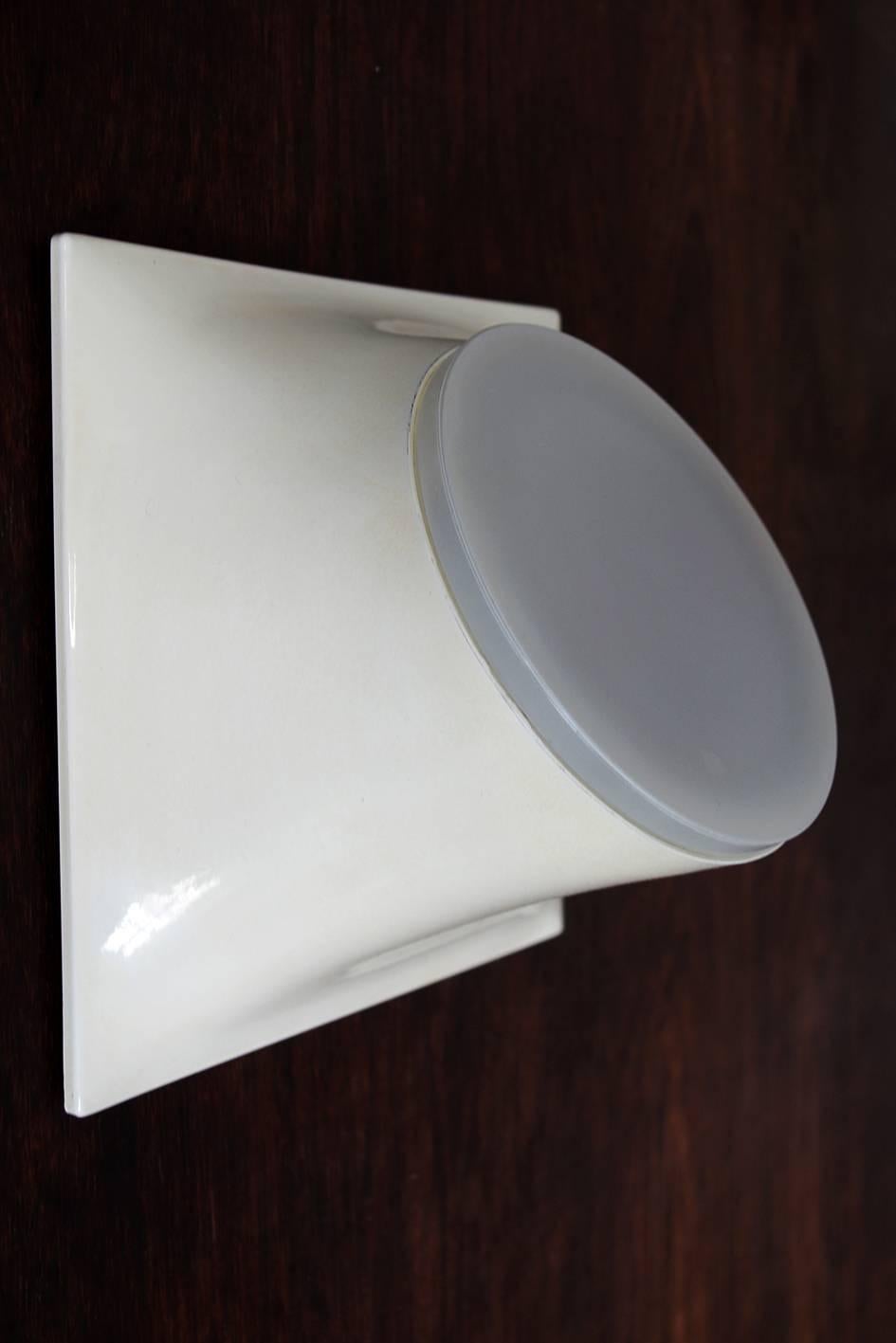 One of ... Minimalist flush mount by Giotto Stoppino. 
Holland, 1970s

Lamp sockets: 1x E27 (US E26).
 