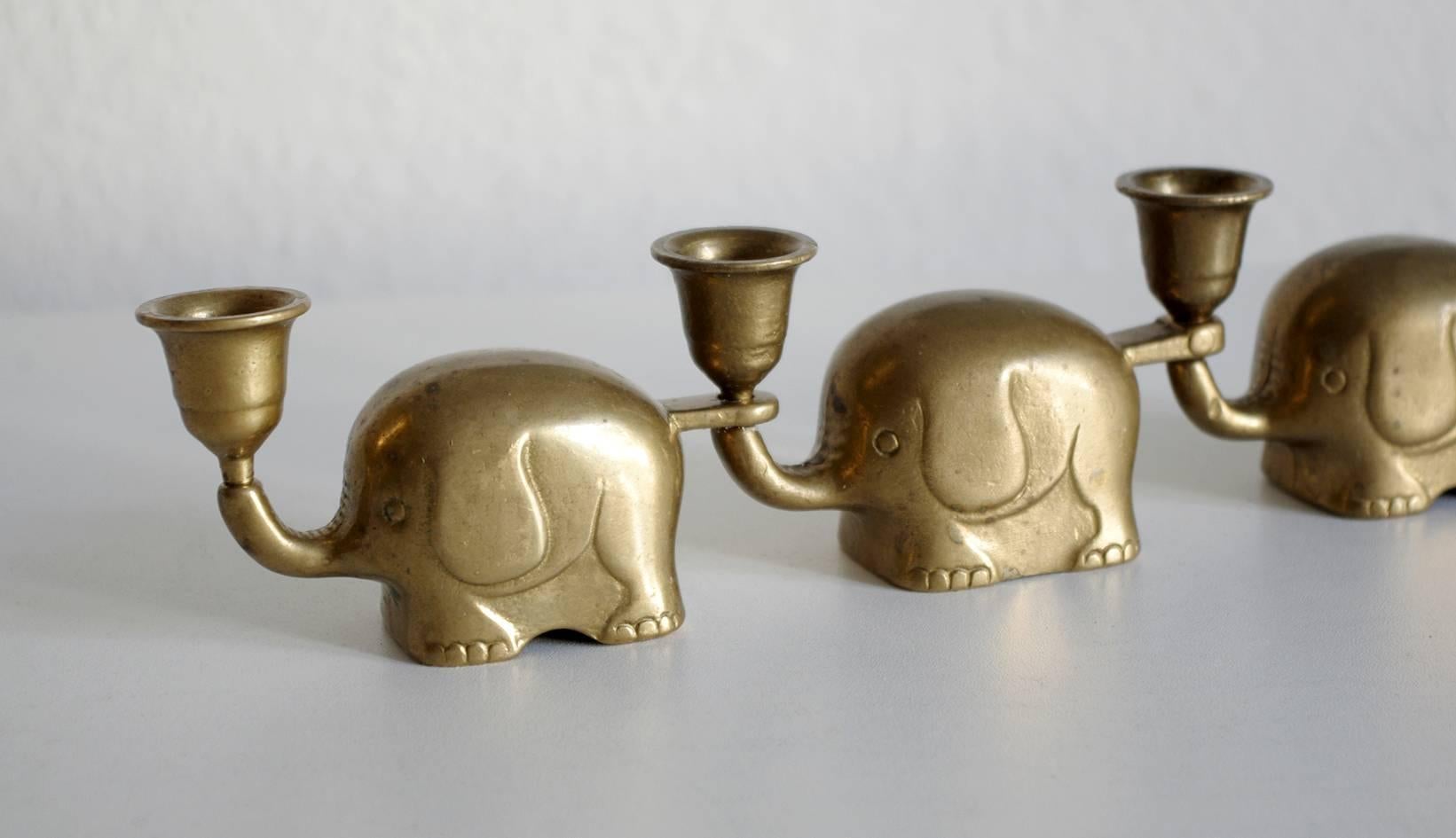 Very rare set of Art Deco brass candlesticks Elephant Herd.
Germany, 1940s
   
   