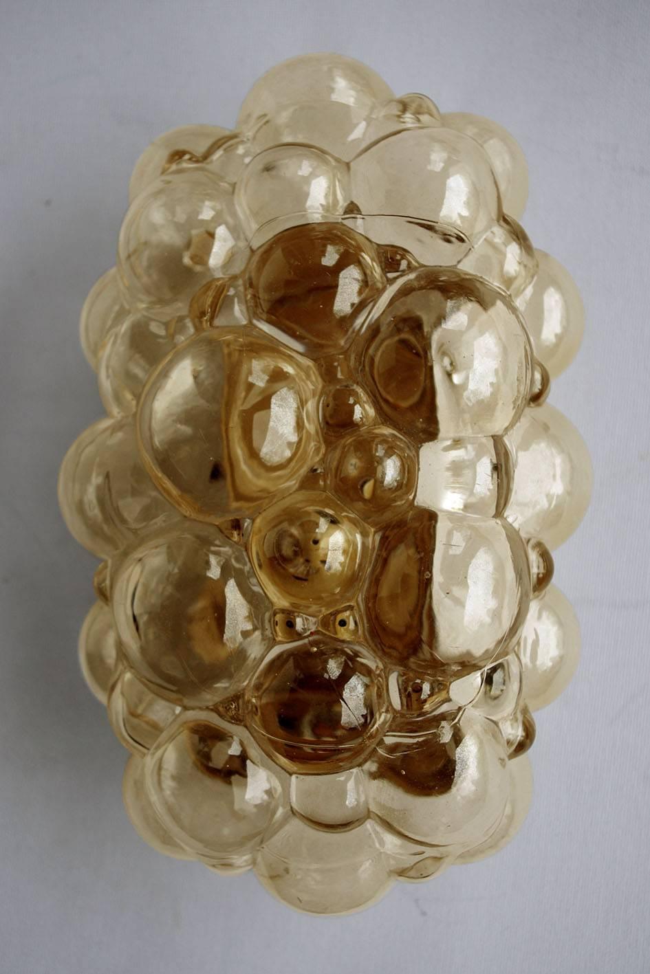 Beautiful set of four amber bubble glass wall (or ceiling) flush mounts.
Germany, 1960s.

   