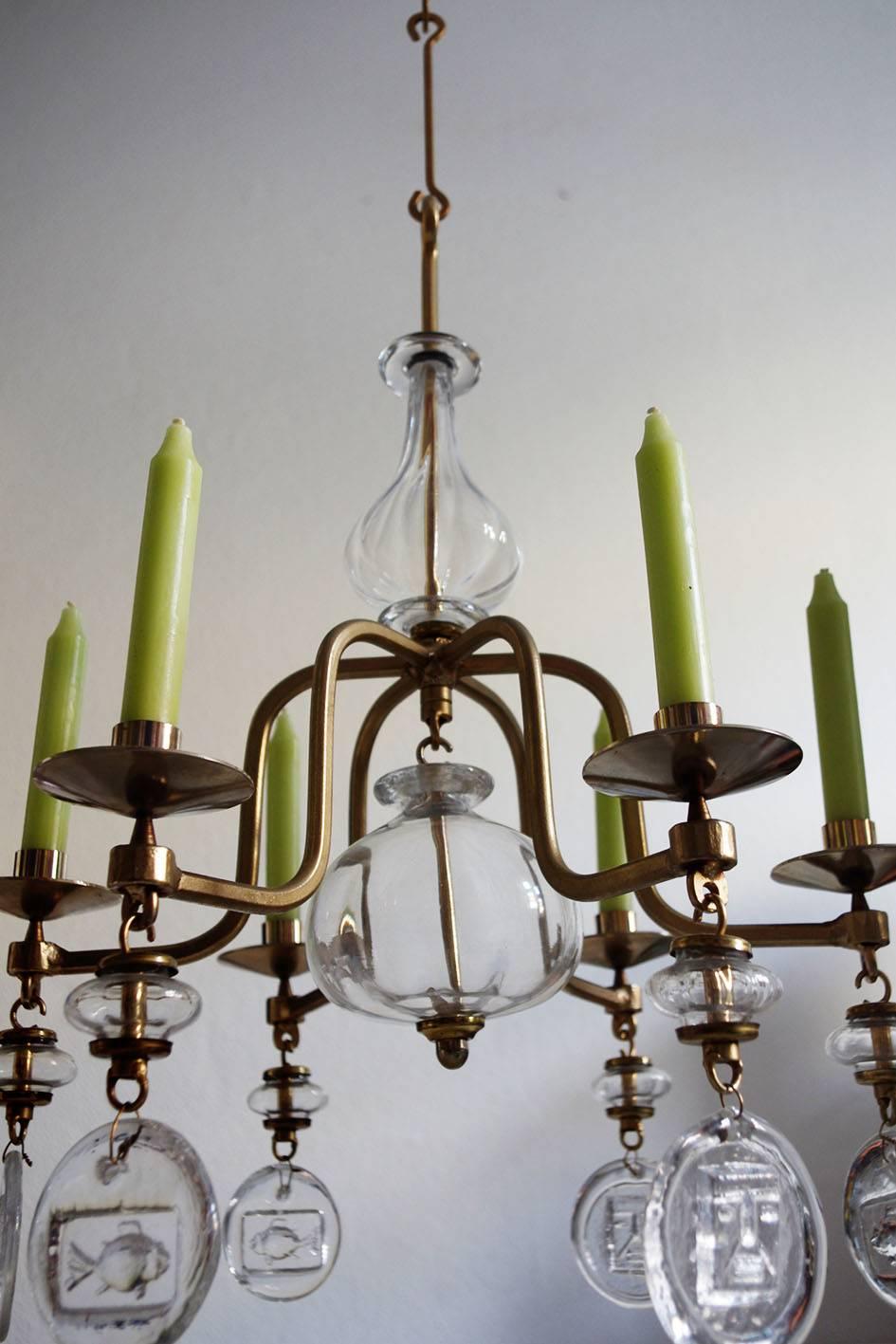 Scandinavian six-arm clear art glass and gilt metal candelabra chandelier by Erik Hoglund 
Boda, Sweden, 1960s.

Measures: Height (Body): 23.6