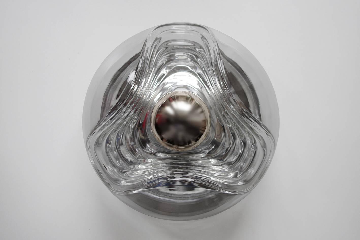 Pair of organic sculptural clear glass flush mounts.
Germany, 1960s-1970s.

Lamp sockets: 1 x E27 (US E26)
