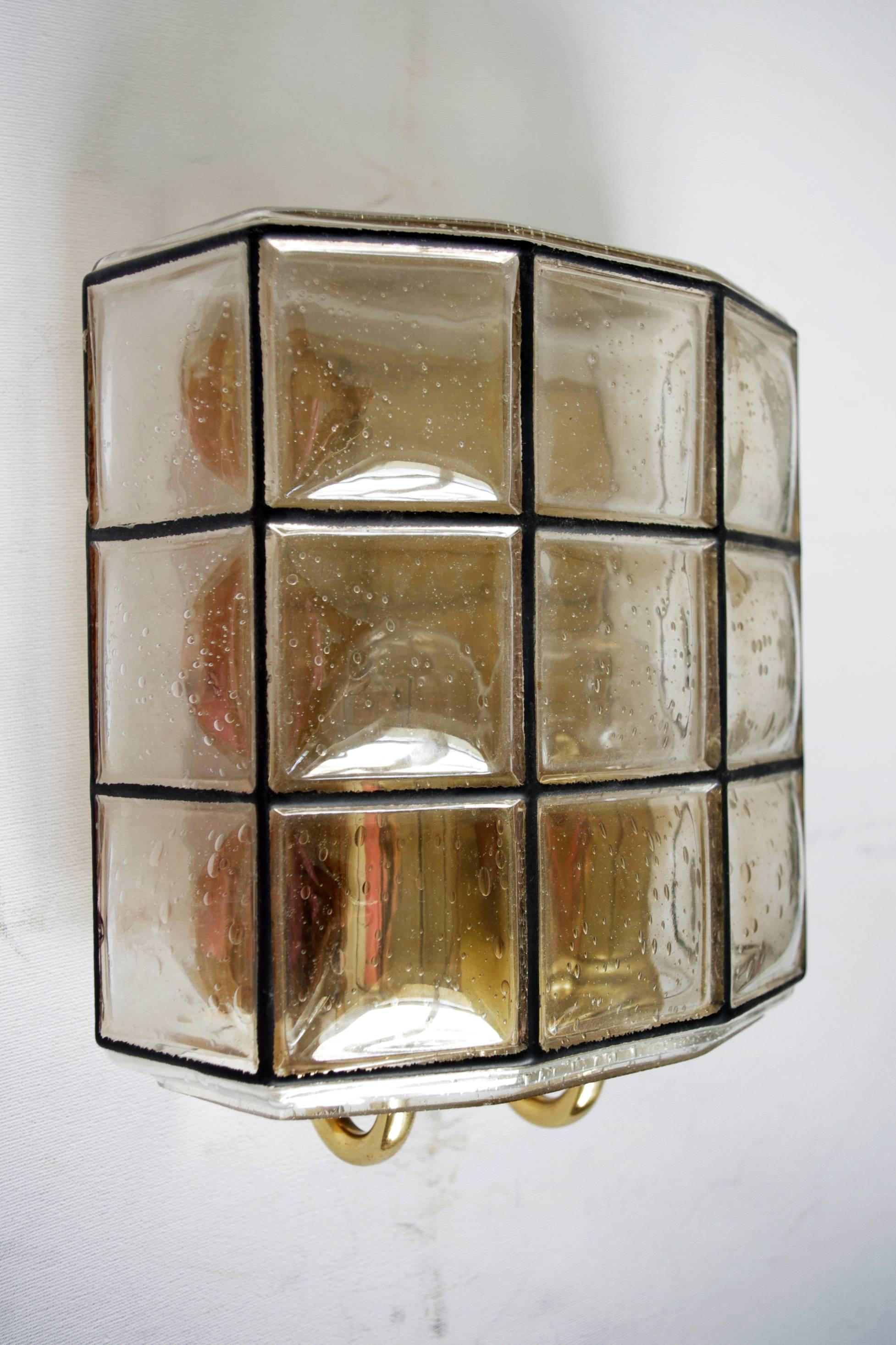 Pair of Art Deco blown bubble glass and brass sconces. 
Germany, 1960s.
Lamp sockets: 2


