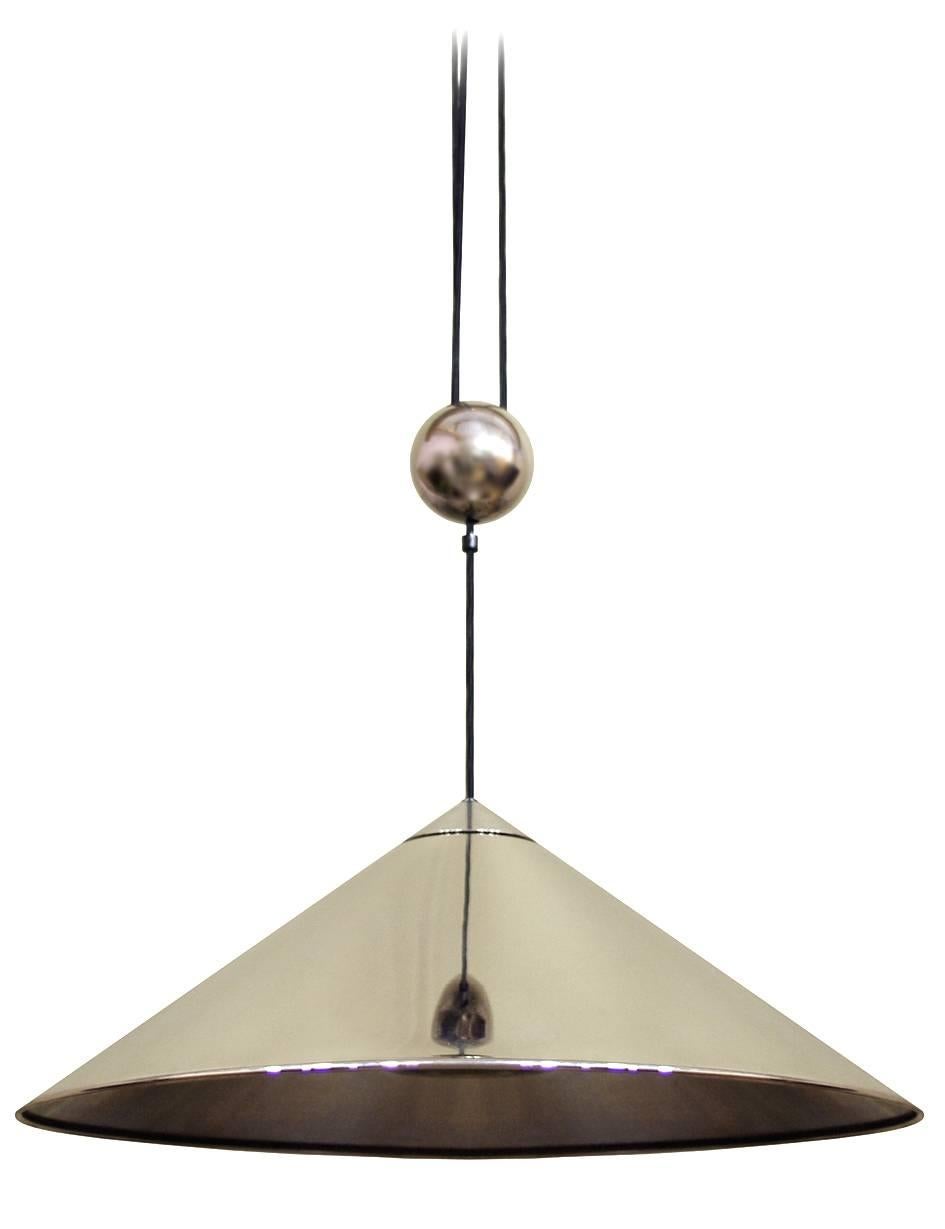 Pair of large adjustable counterweight pendants Keos by Florian Schulz. Germany, 1960s-1970s.
Solid brass nickel-plated version.
Lamp sockets: One x E27 (US E26).
Price for a pair.

 