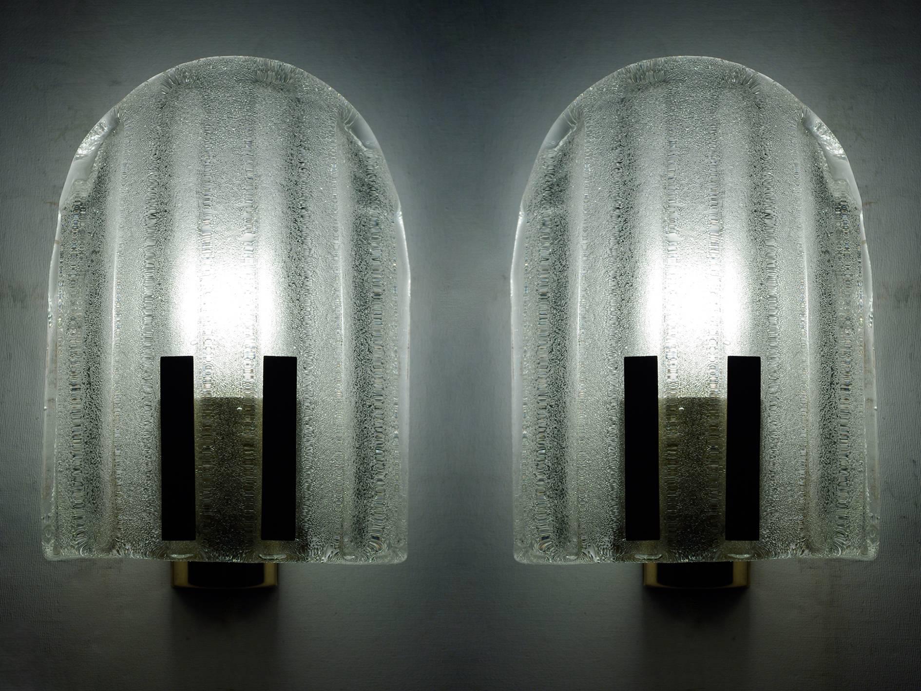 Nicely pair of glass and brass sconces.
Italy, 1960s.

Lamp sockets: One x E27 (US E26).