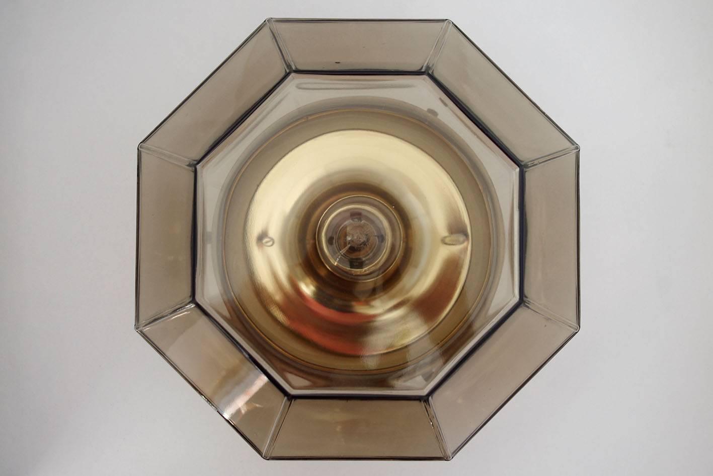 Pair of large geometric glass and brass ceiling or wall flush mounts.
Germany, 1960s
Lamp sockets: 1x E27 (US E26)