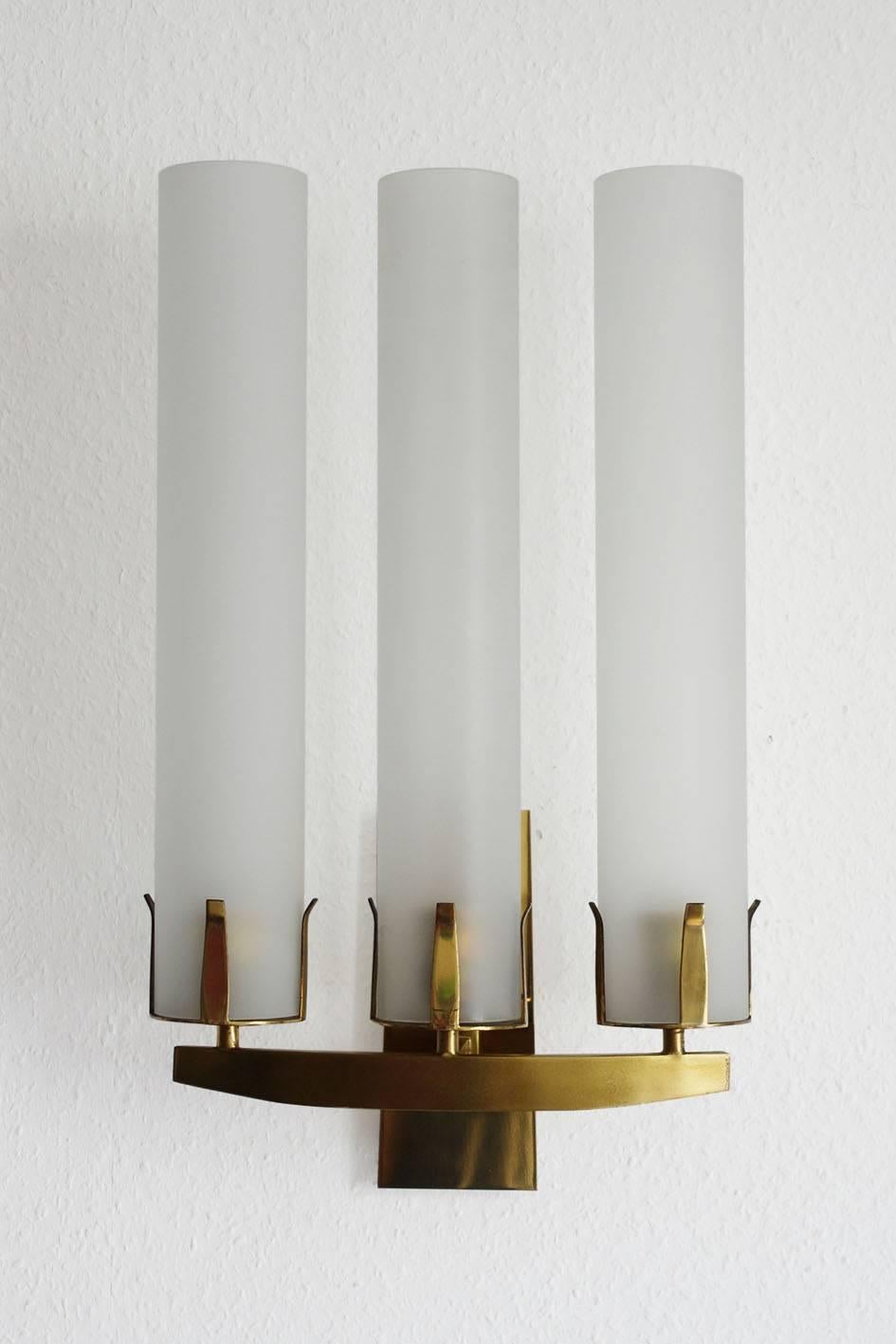 One of seven rare huge glass and solid brass wall light.
France, 1950s.

Lamp sockes: 3x E27 (US E26).