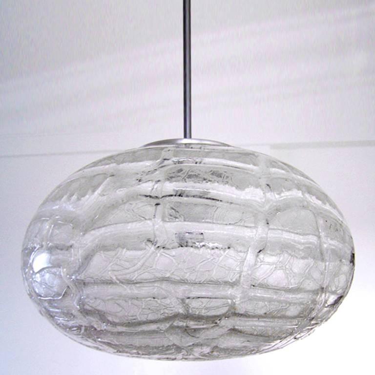 Very rare and large massive white murano glass pendants by Doria.
Germany, 1970s.
Lamp sockets: 1x E27 (US: E26)

Or two round.