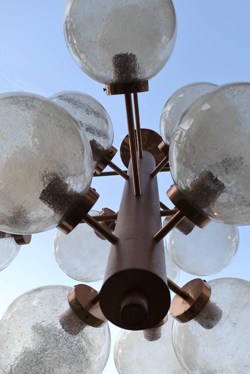 PAIR of Impressive Sputnik chandeliers with 16 beautiful handmade glass globes.
Germany, 1960s.
Measurements:
Height (body) 48 in.
Diameter 43.5 in
Diameter (glass globes) 10 in
Lamp sockets: 16 x E27.