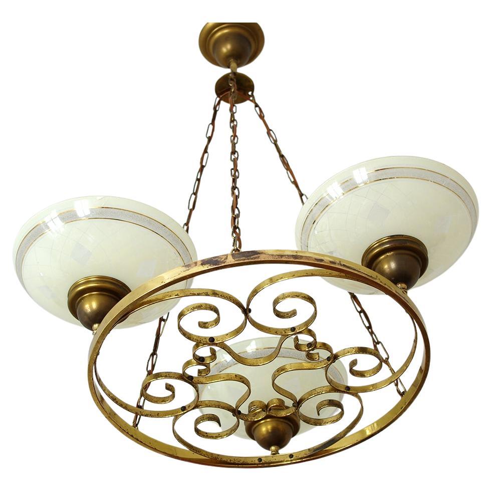 Lampadario tedesco d
epoca in ottone e vetro, anni
40