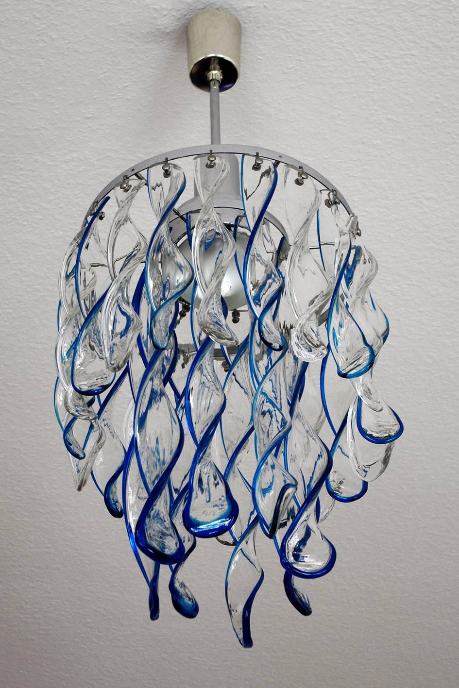 Very beautiful pendant chandelier, with clear and blue Murano glass swirl elements (20