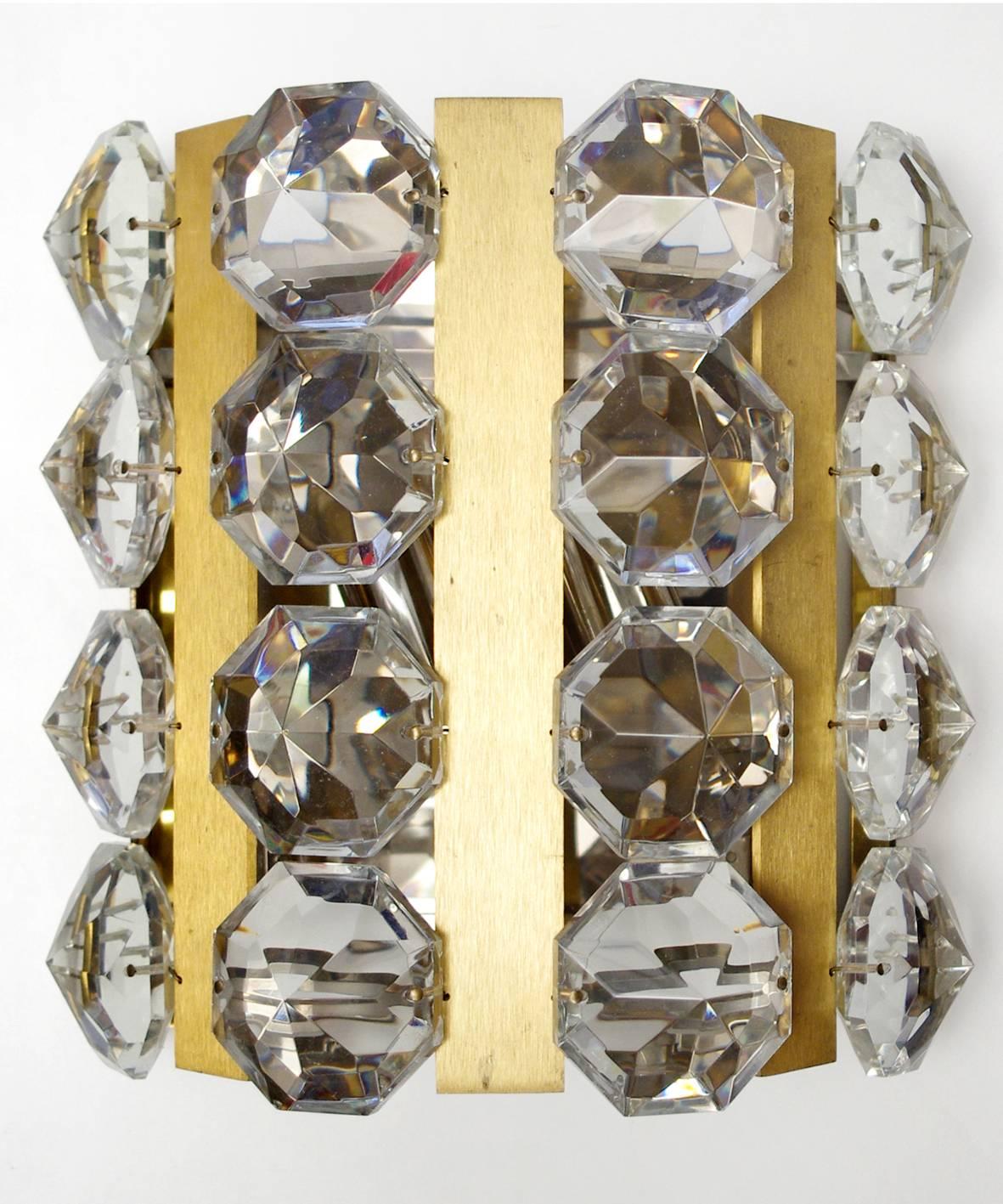 Set of three beautiful large sconces with 16 large crystals.
Austria, 1960s.
Measures: Height 9.85 in, width 9.05 in, depth 5.10 in.
 
