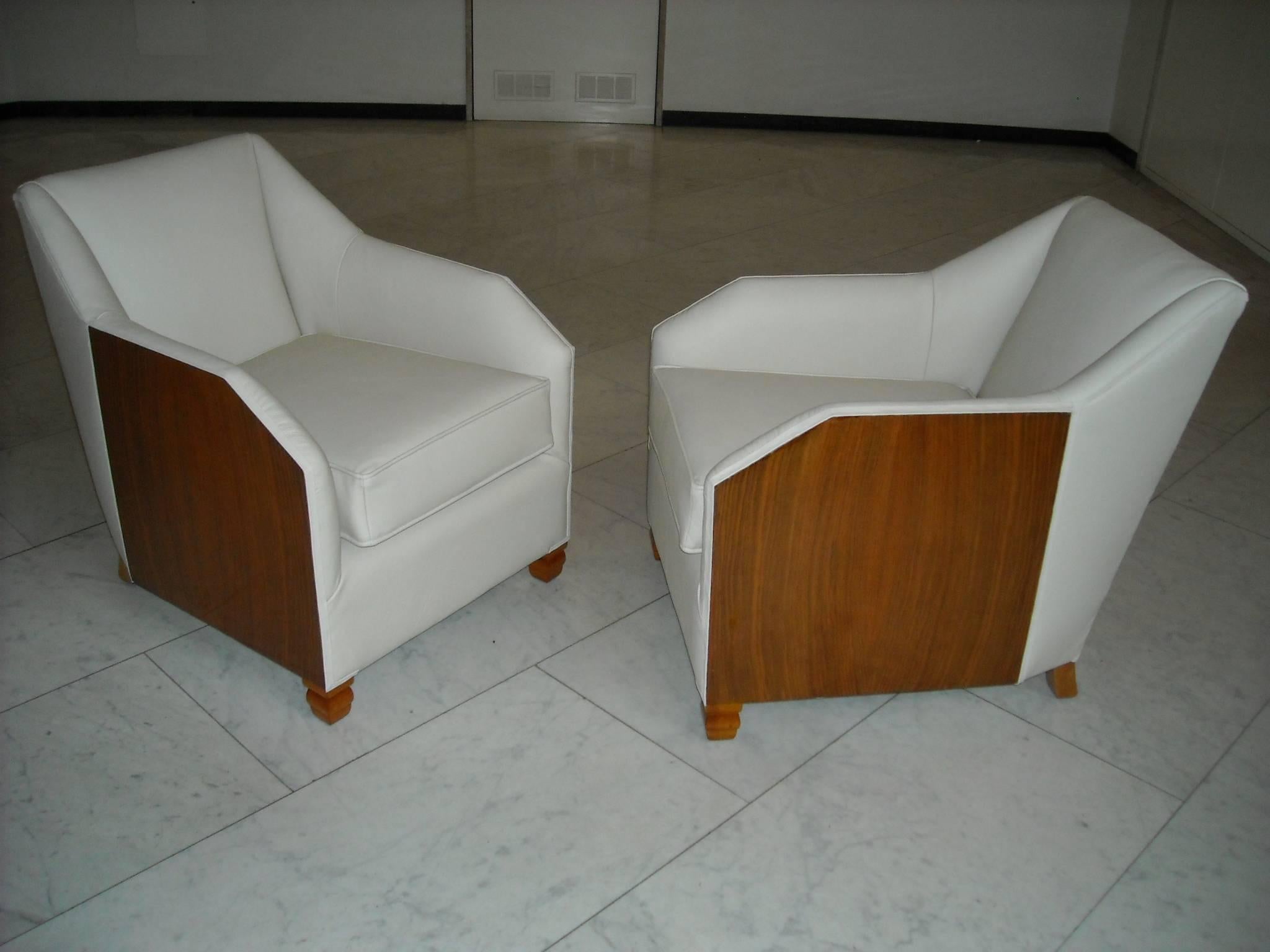 Charming small pair of 1930 armchairs completely restored re upholstered and covered with off white leather.