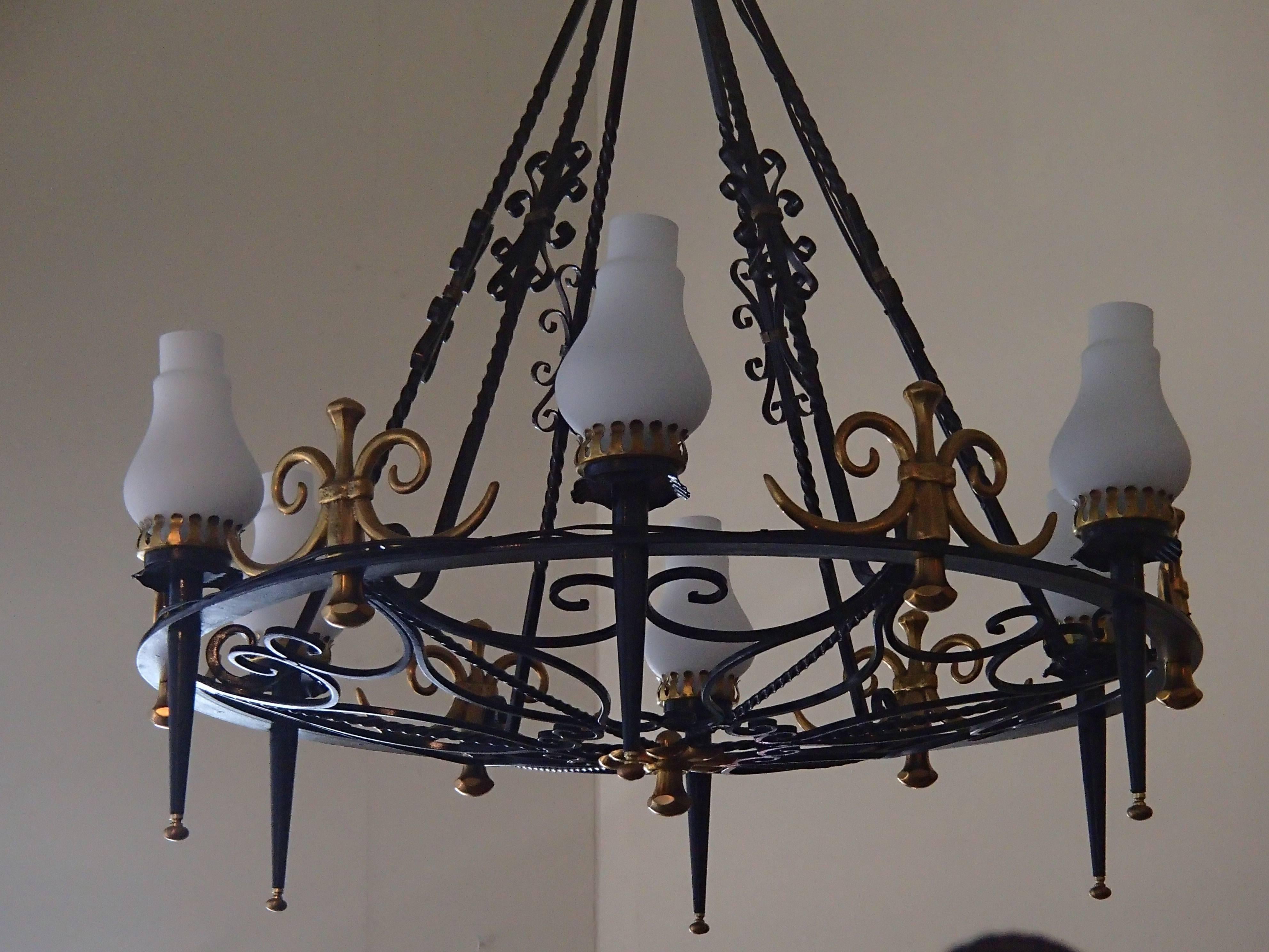 Hughes decorative 1940 chandelier made of wrought iron and brass ornaments six opal glasses. Rewired and ready to use.