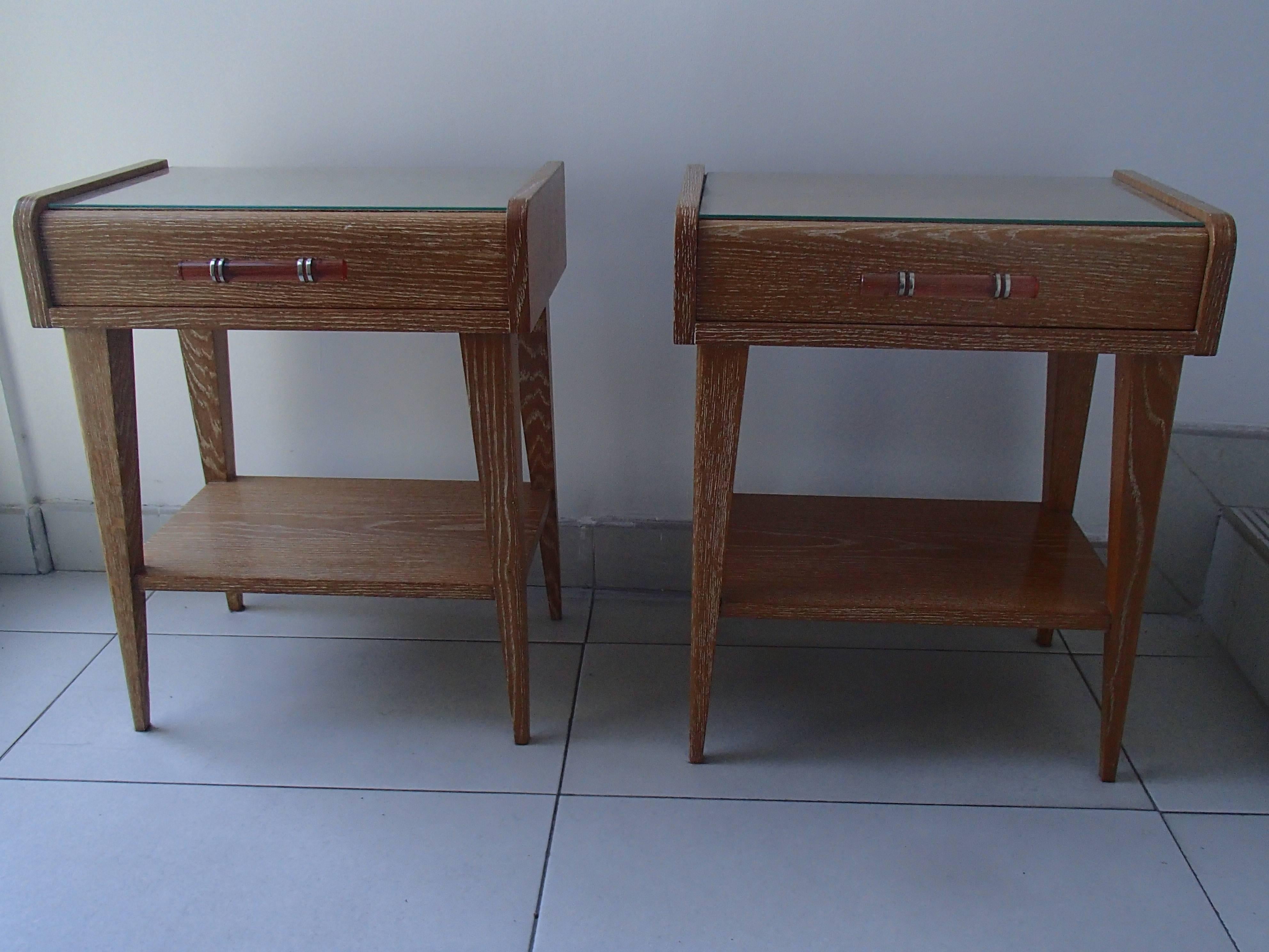 Pair of elegant 1940 side tables cerused oak with one drawer with rose glass handle and a shelf.