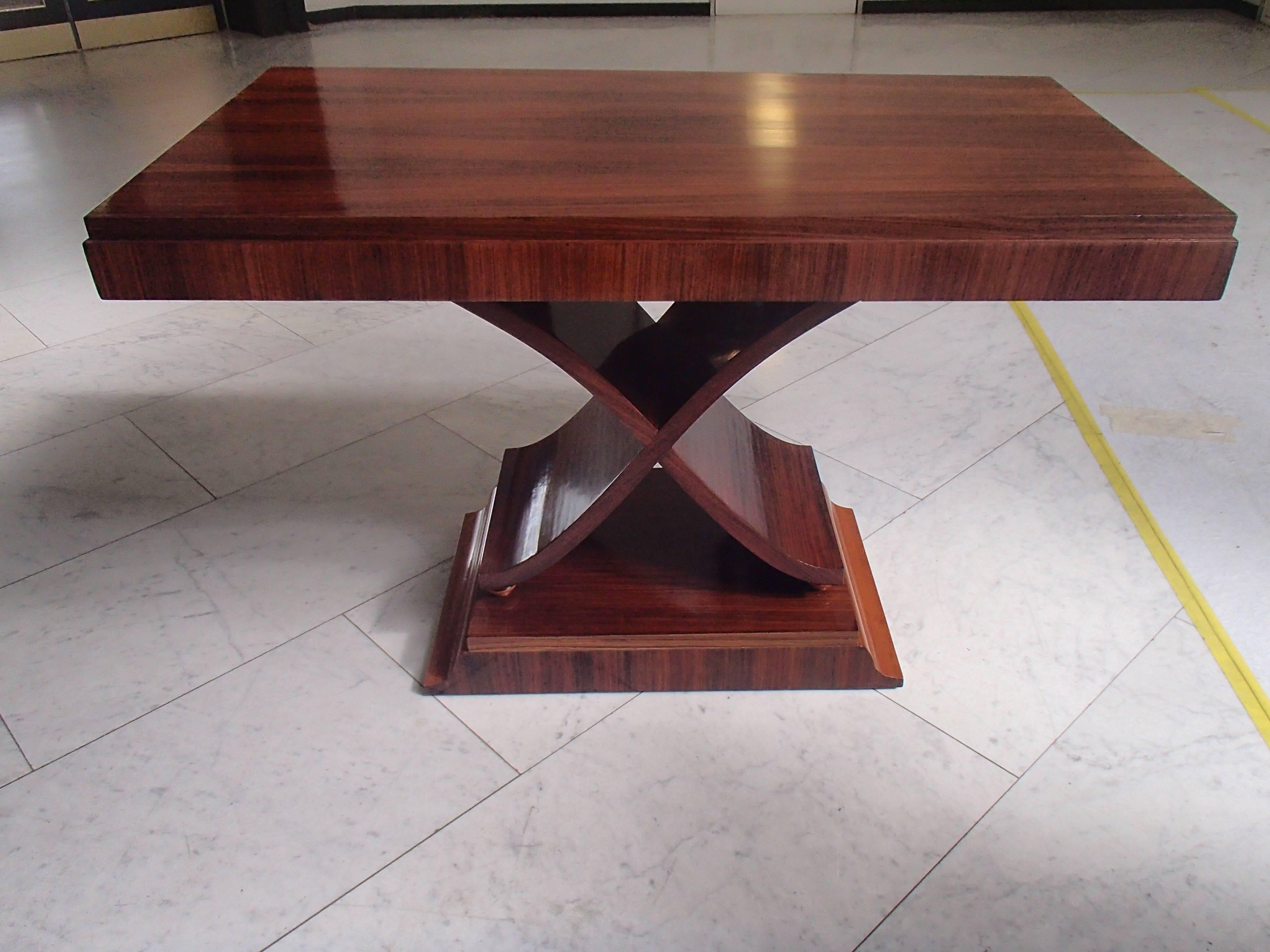 Large rosewood console, side table with a beautiful X-shaped leg standing on four balls. The top is slightly unequal.
