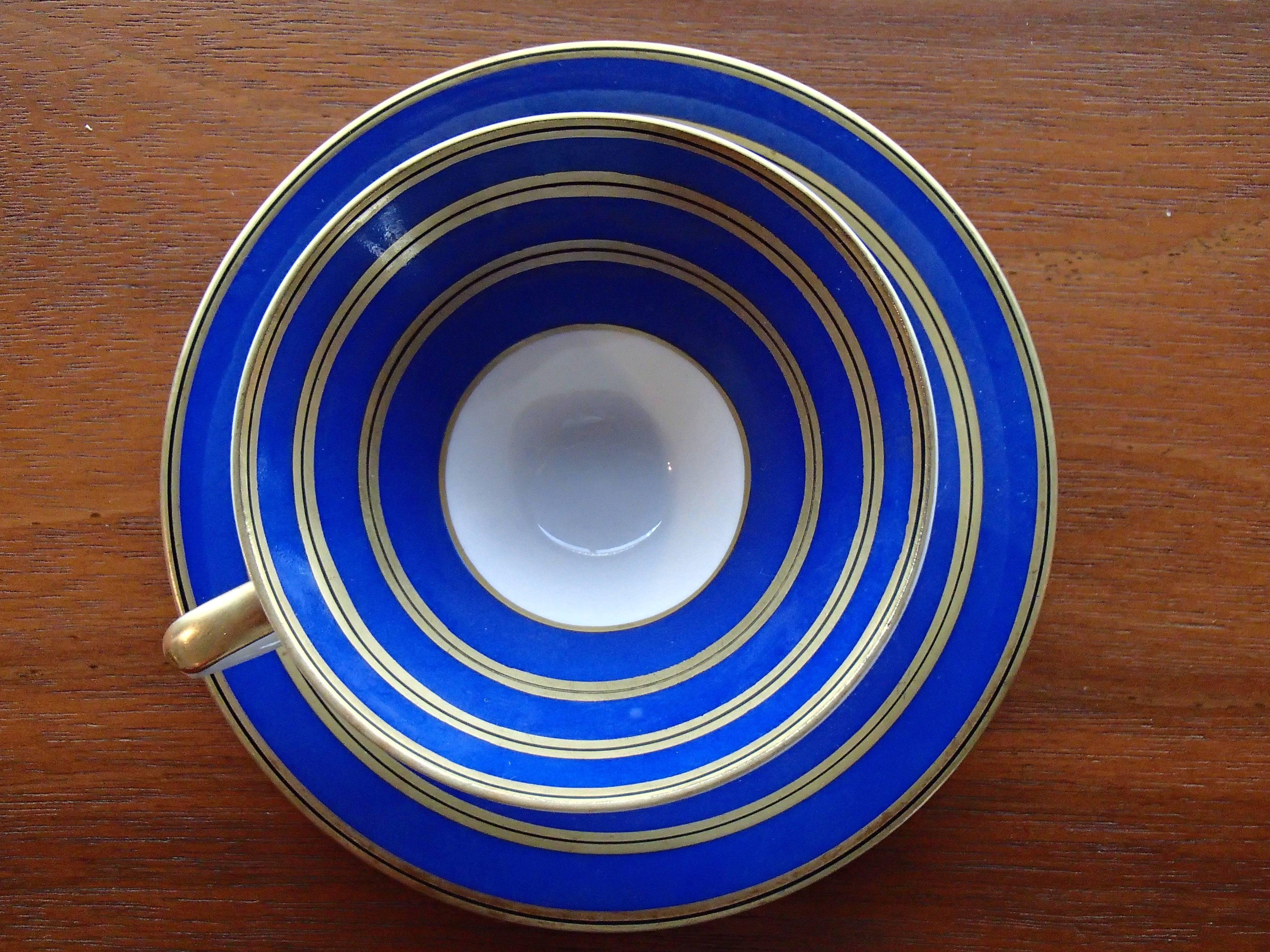 20th century coffee cup and sauces 
Bavaria cobalt blue/gold Johan Seltmann Vohenstrauss Modelnr. 4537 in perfect condition.