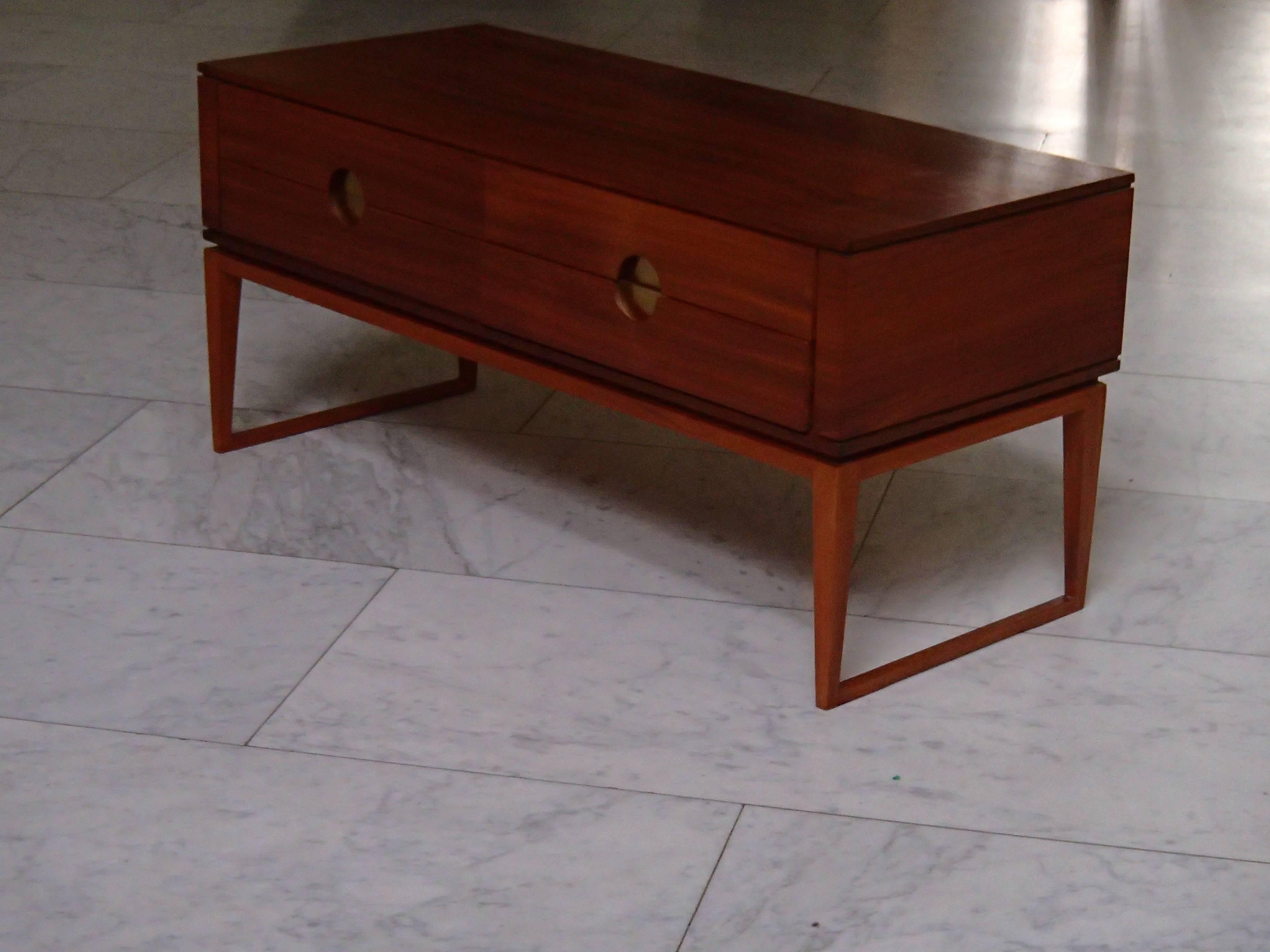 very high quality Mid century modern low board 4 drawers cherry wood and handles that are in form of an circle inlaid with brass 