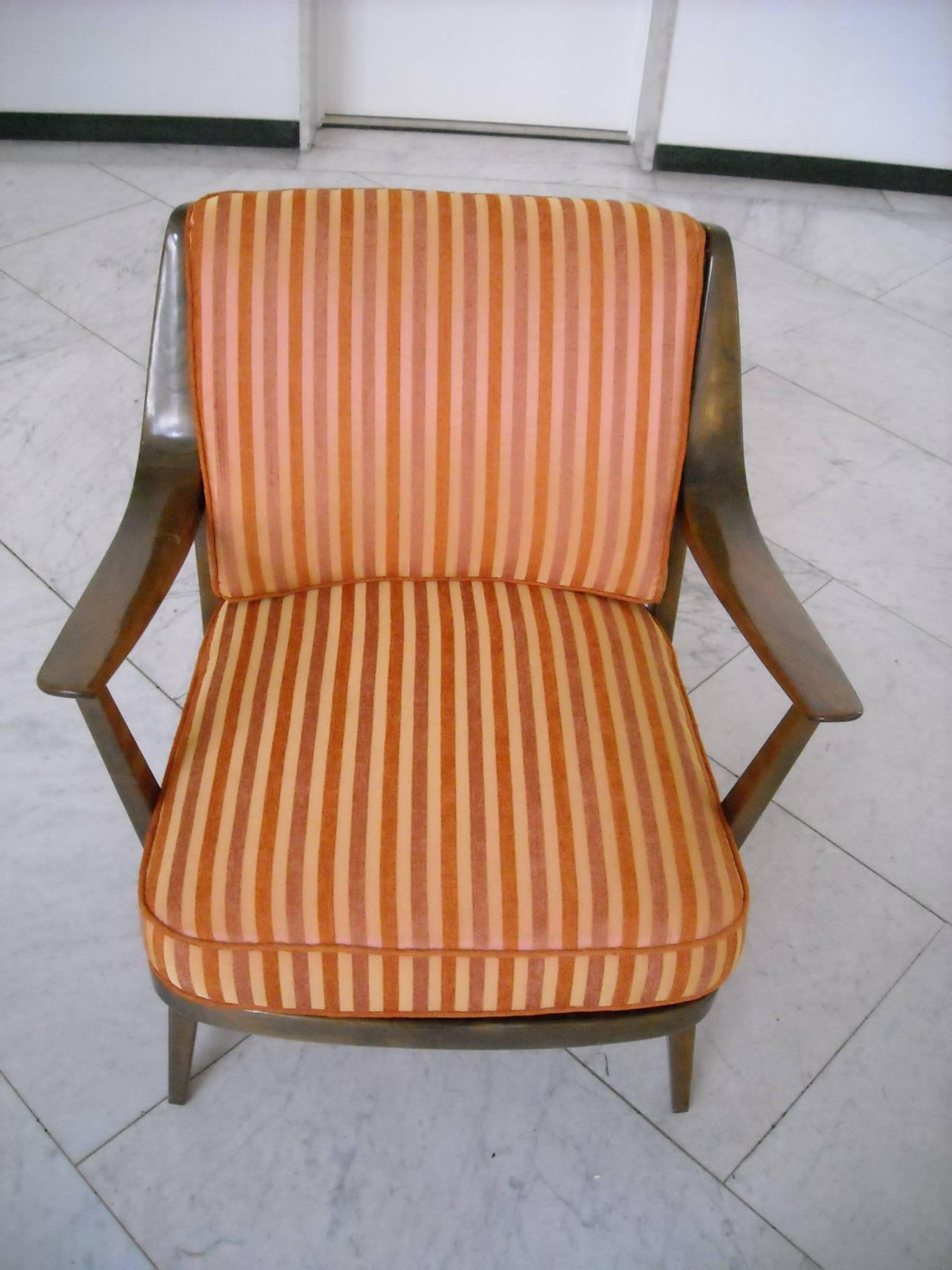 very light and comfortable pair of Knoll Antimott armchairs restored in  tinted birch cuissons re upholstered and recovered with yellow orange striped silk 