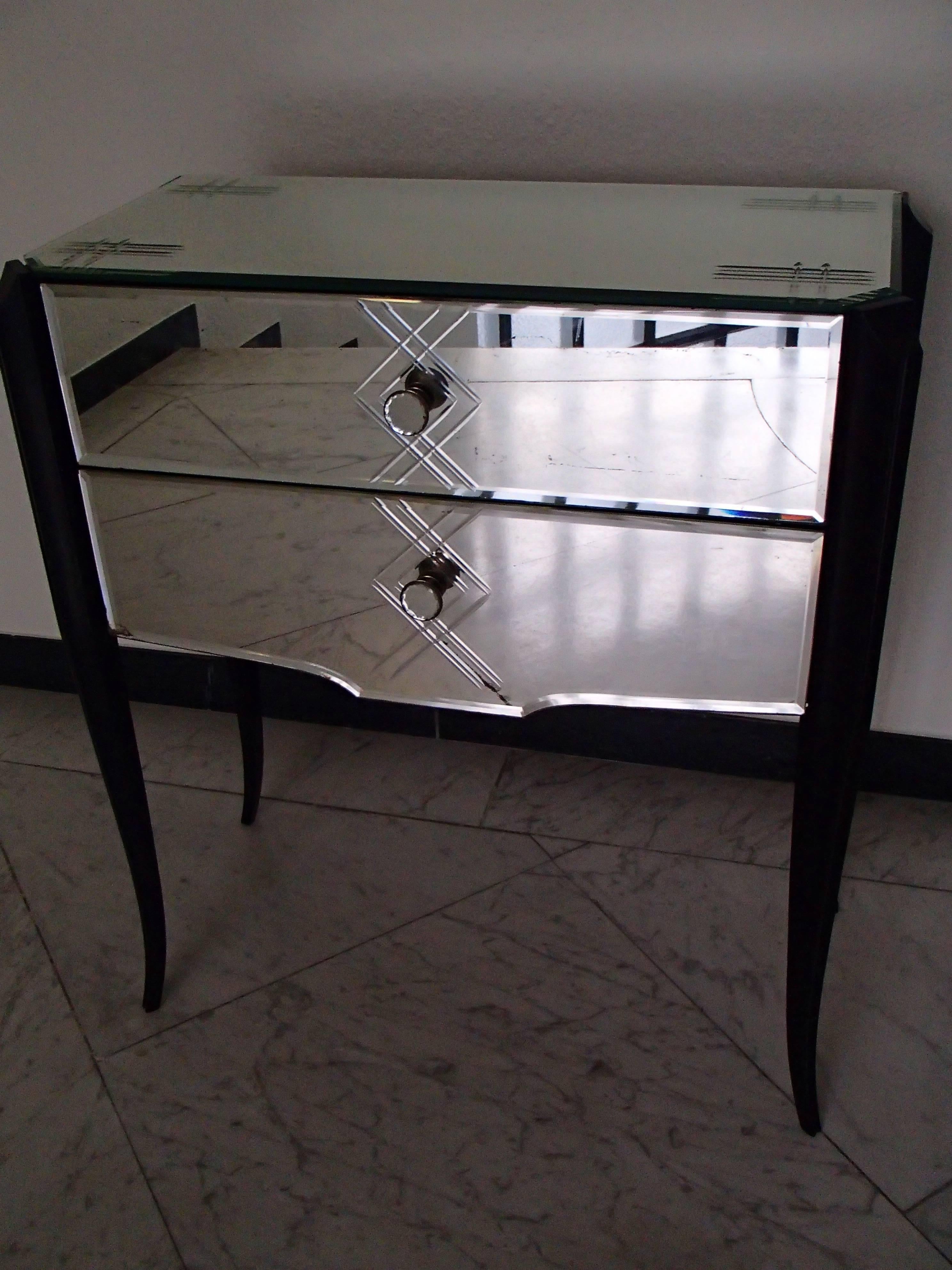 Art Deco small console two-drawer cabinet engraved mirror and mirrored buttons black curved legs restored with black shellac also the backside.