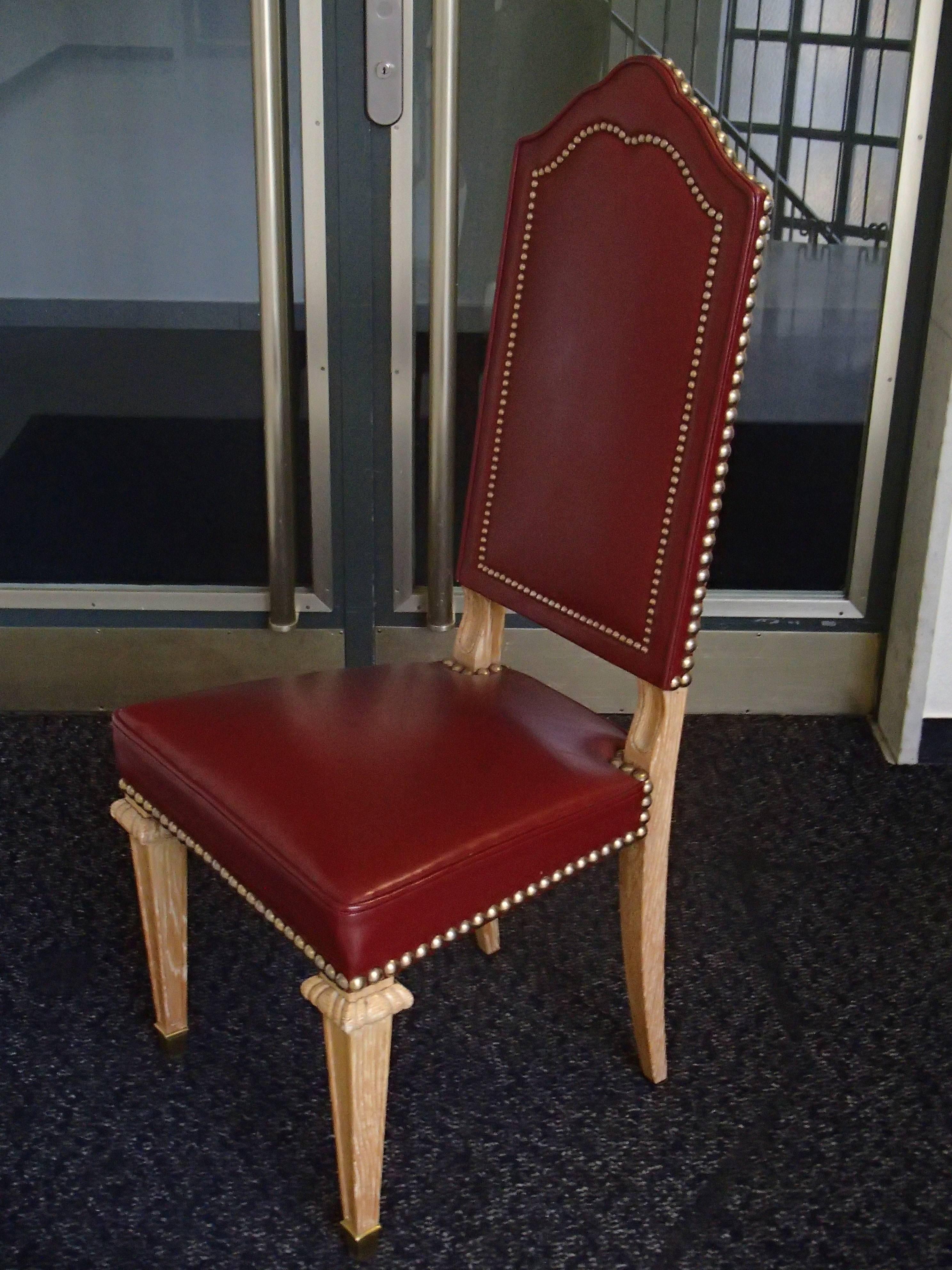 Six dining room chairs dark red leather cerused oak. The leather is from the period very robust and thick, shows only minor wear. The frame is chalked oar that has been restored.