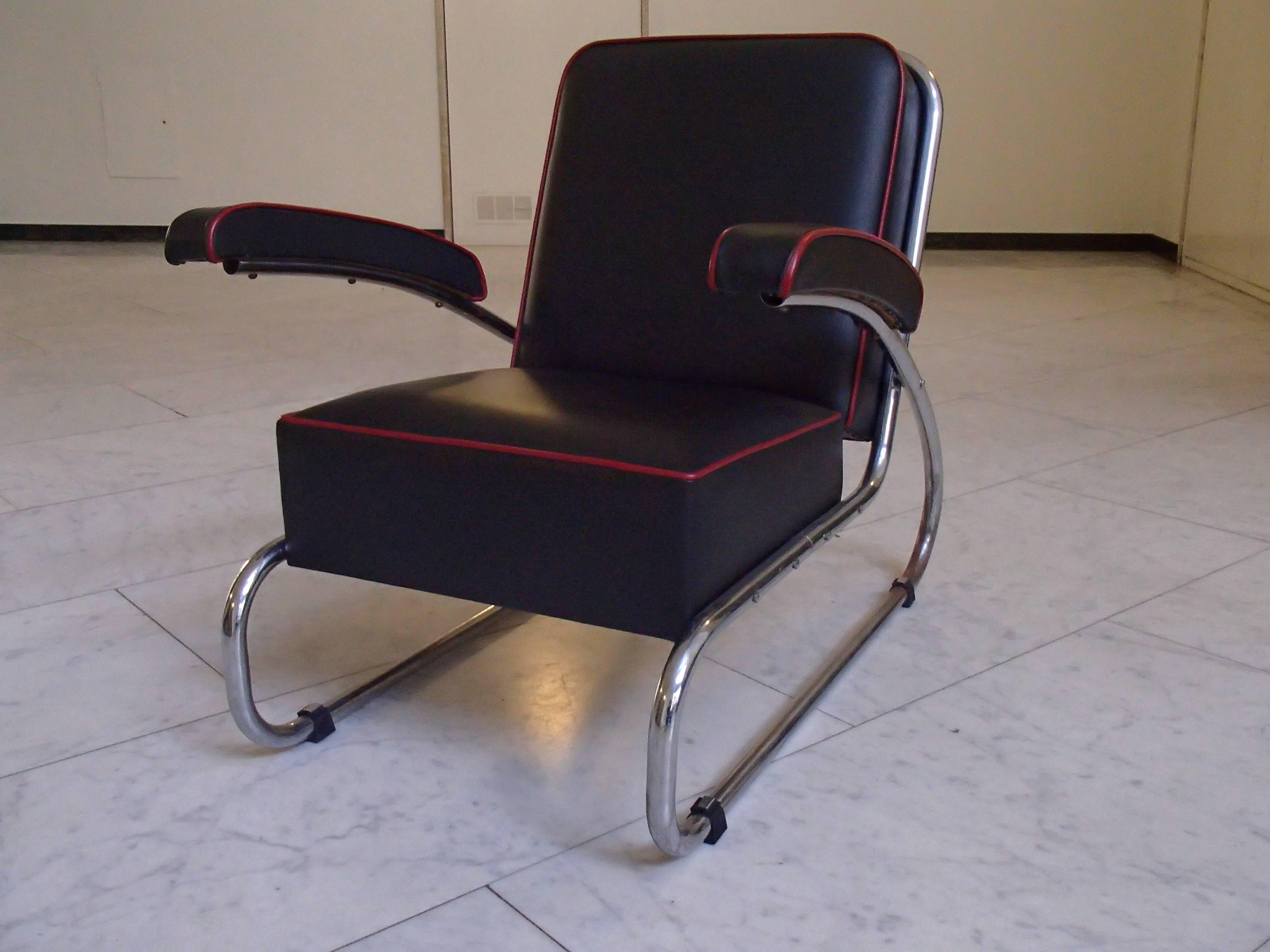 Pair of Bauhaus chrome black leather lounge chairs red by Gottwald. New reupholstered and recovered with leather. The chrome is in its original condition and shows wear on the legs.