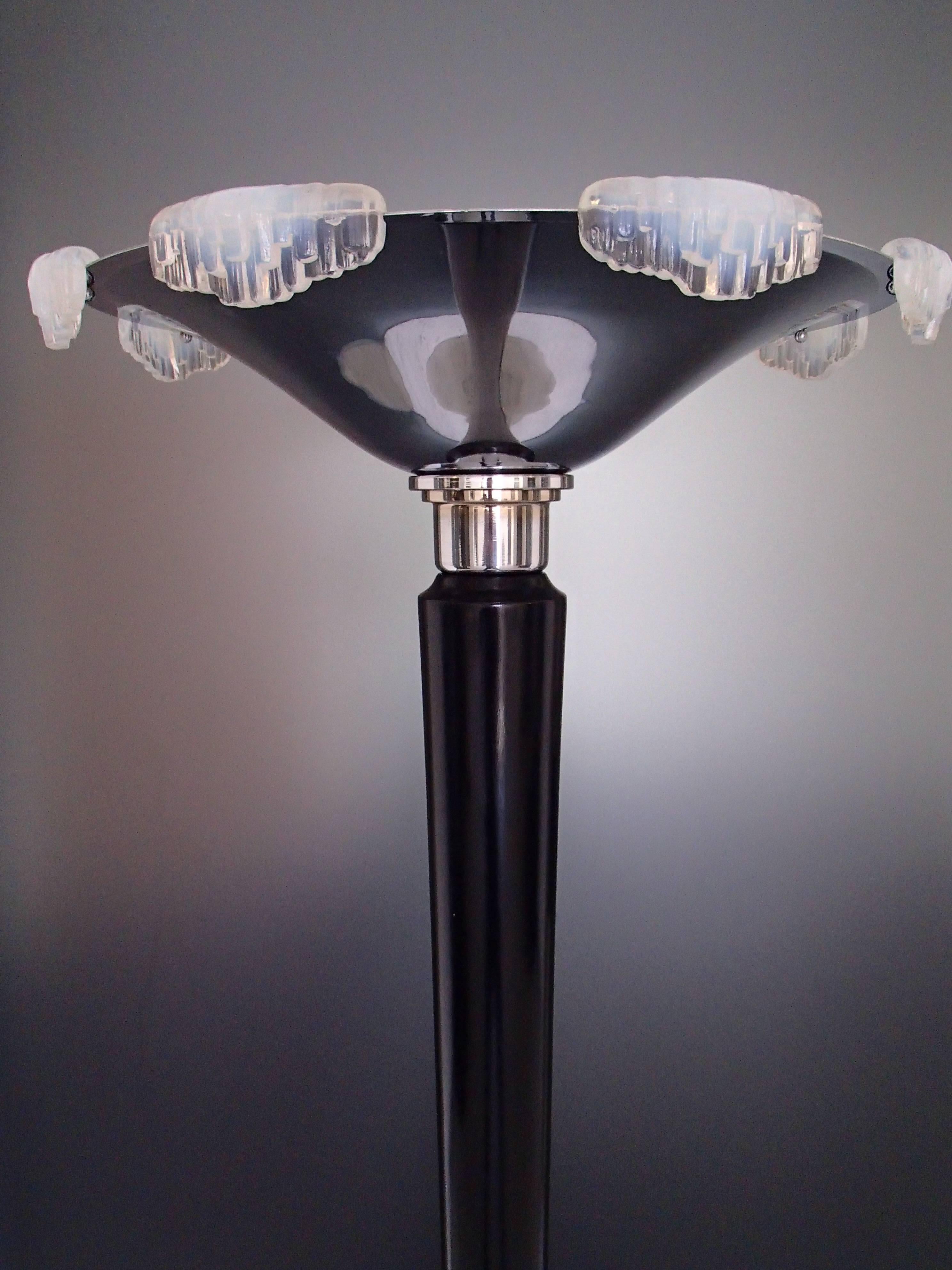 Art Deco floor lamp or torch chrome with sabino glass parts. On the glass parts are some chips.