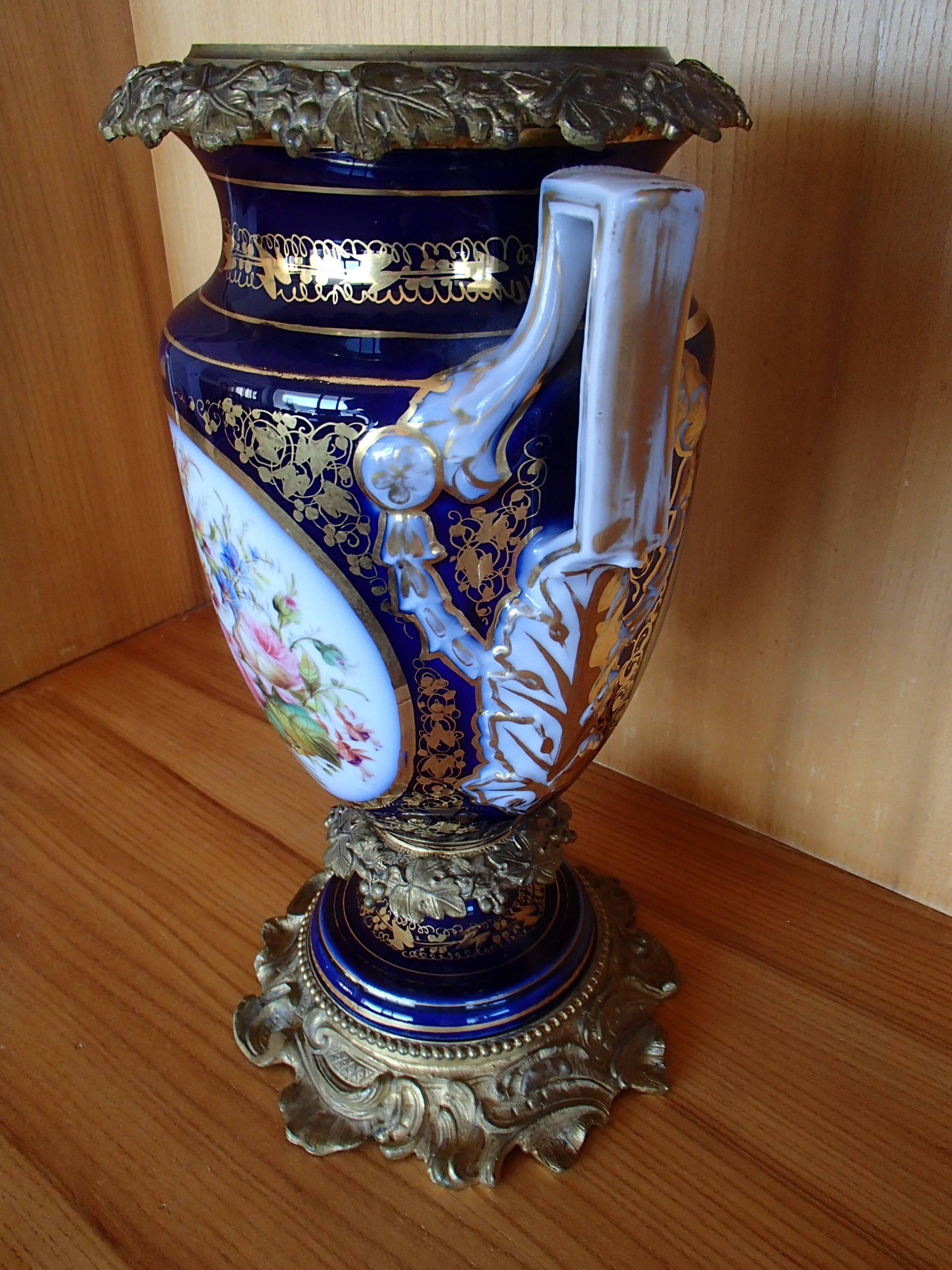 Napoleon III Amphora shaped porcelain in the style of Sèvre vase with bronze parts.